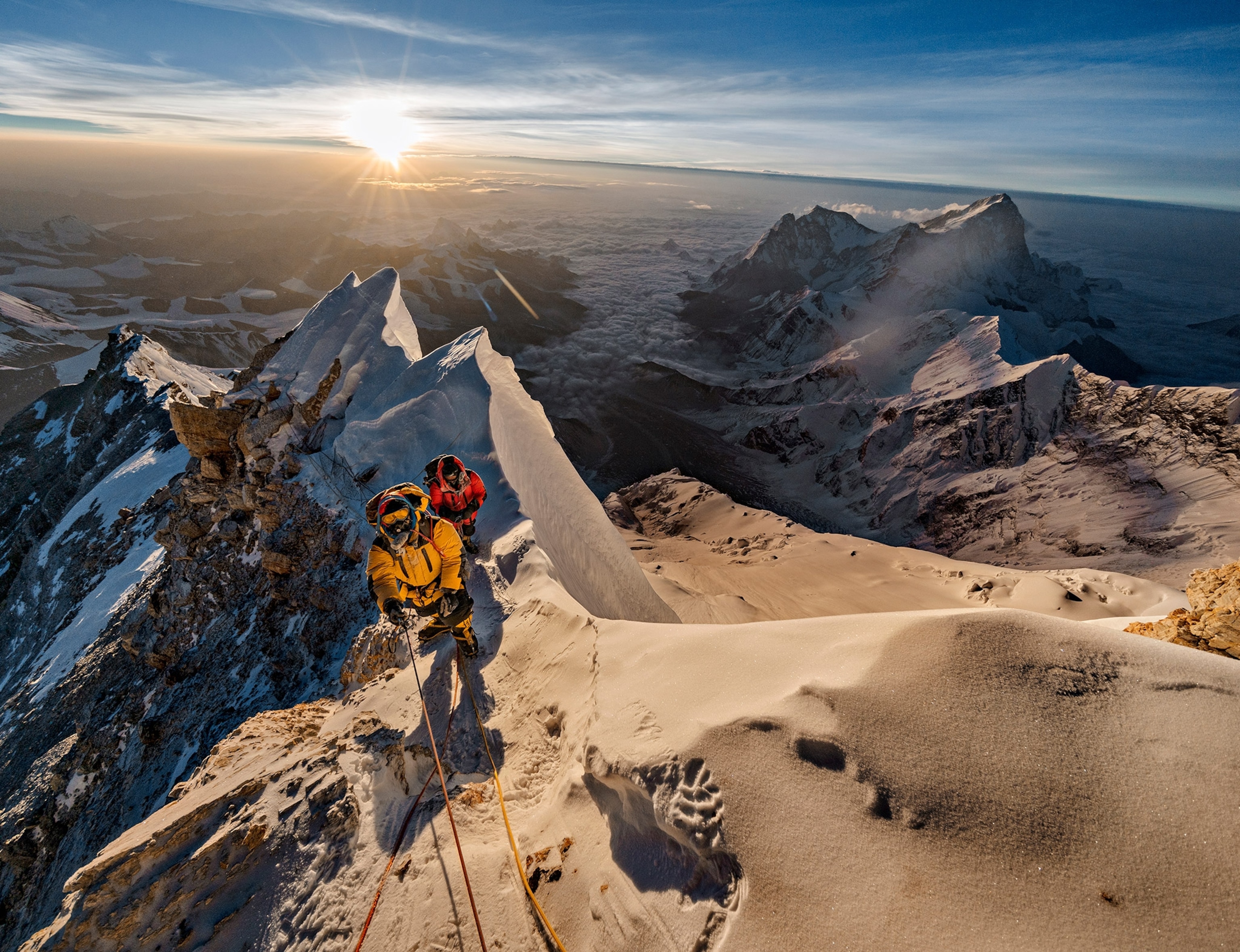 people climbing Mount Everest in Tibet, China