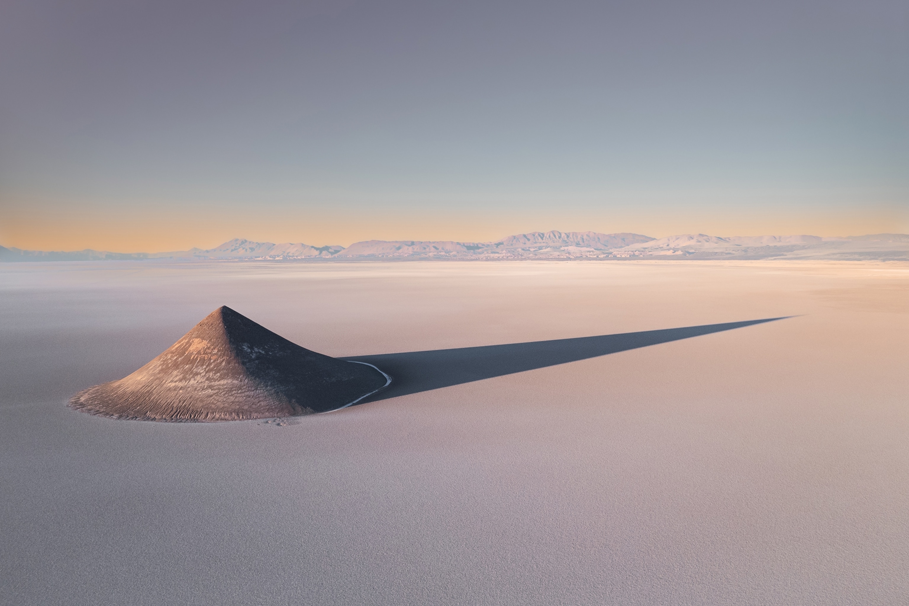 The El Cono de Arita — a cone-shaped natural phenomena in Argentina which resulted from erosion of the salt pan.