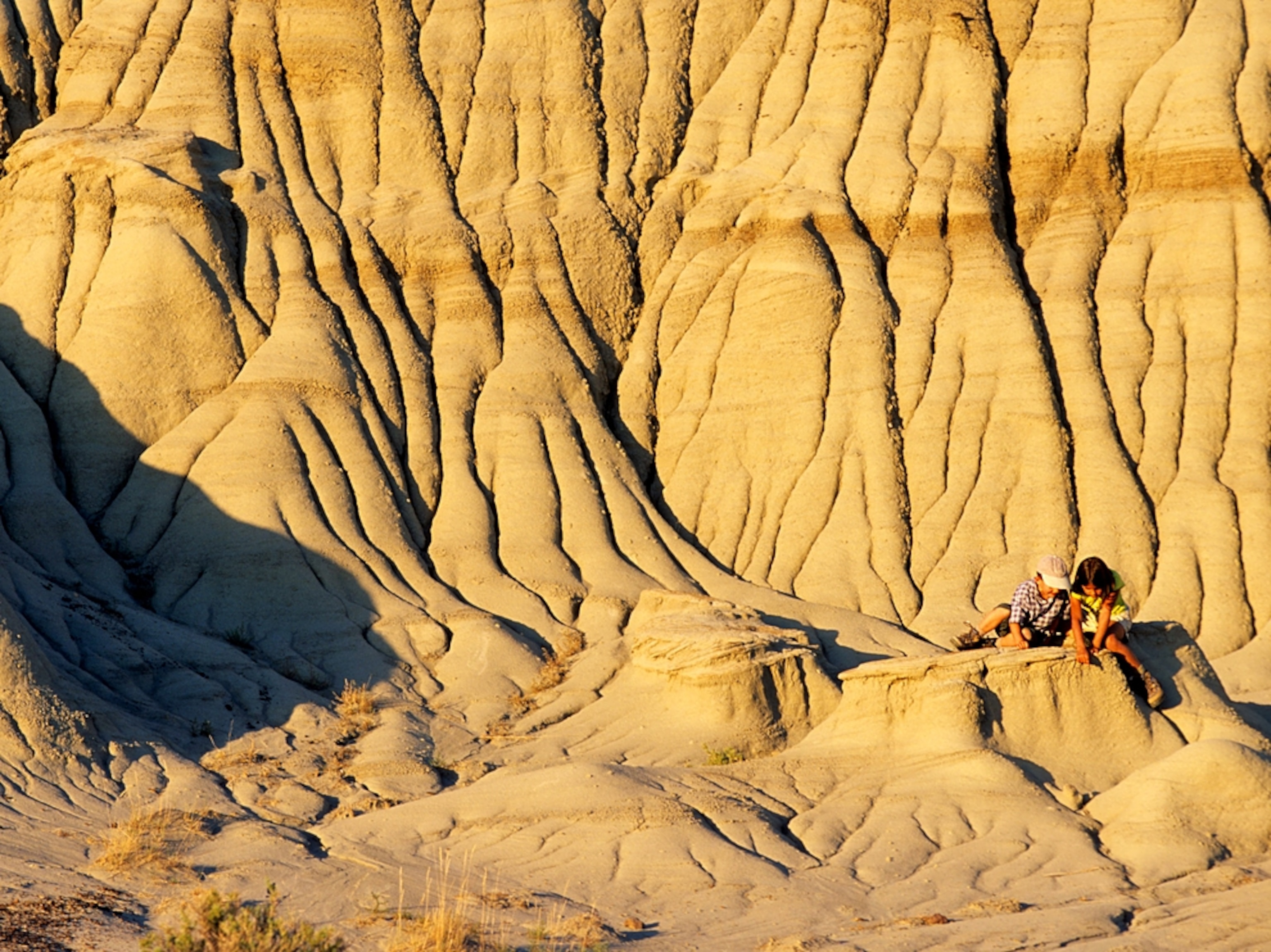 Kids playing at Dinosaur Provincial Park, Alberta, Canada
