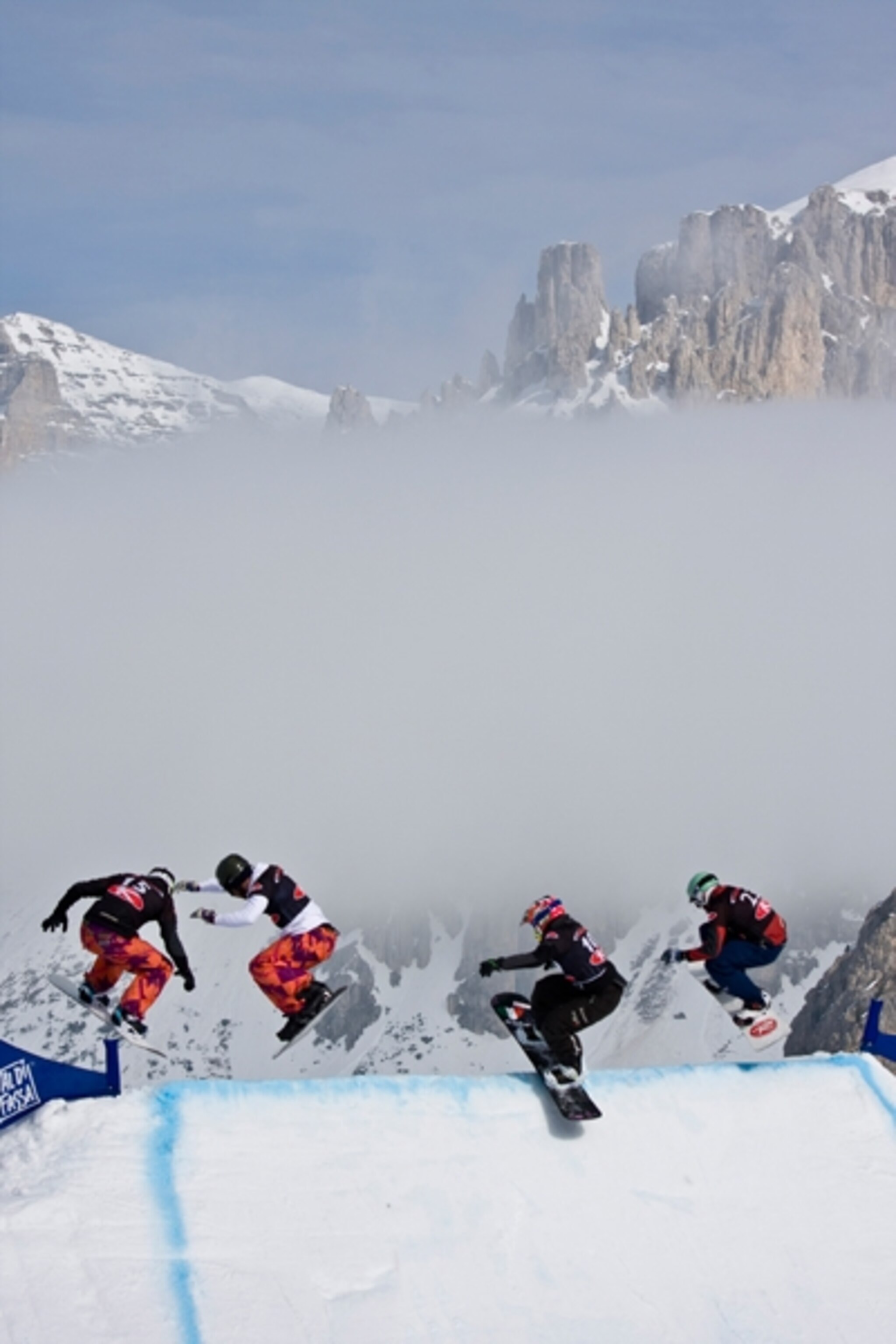 Snowboarders in an Italian Alps race