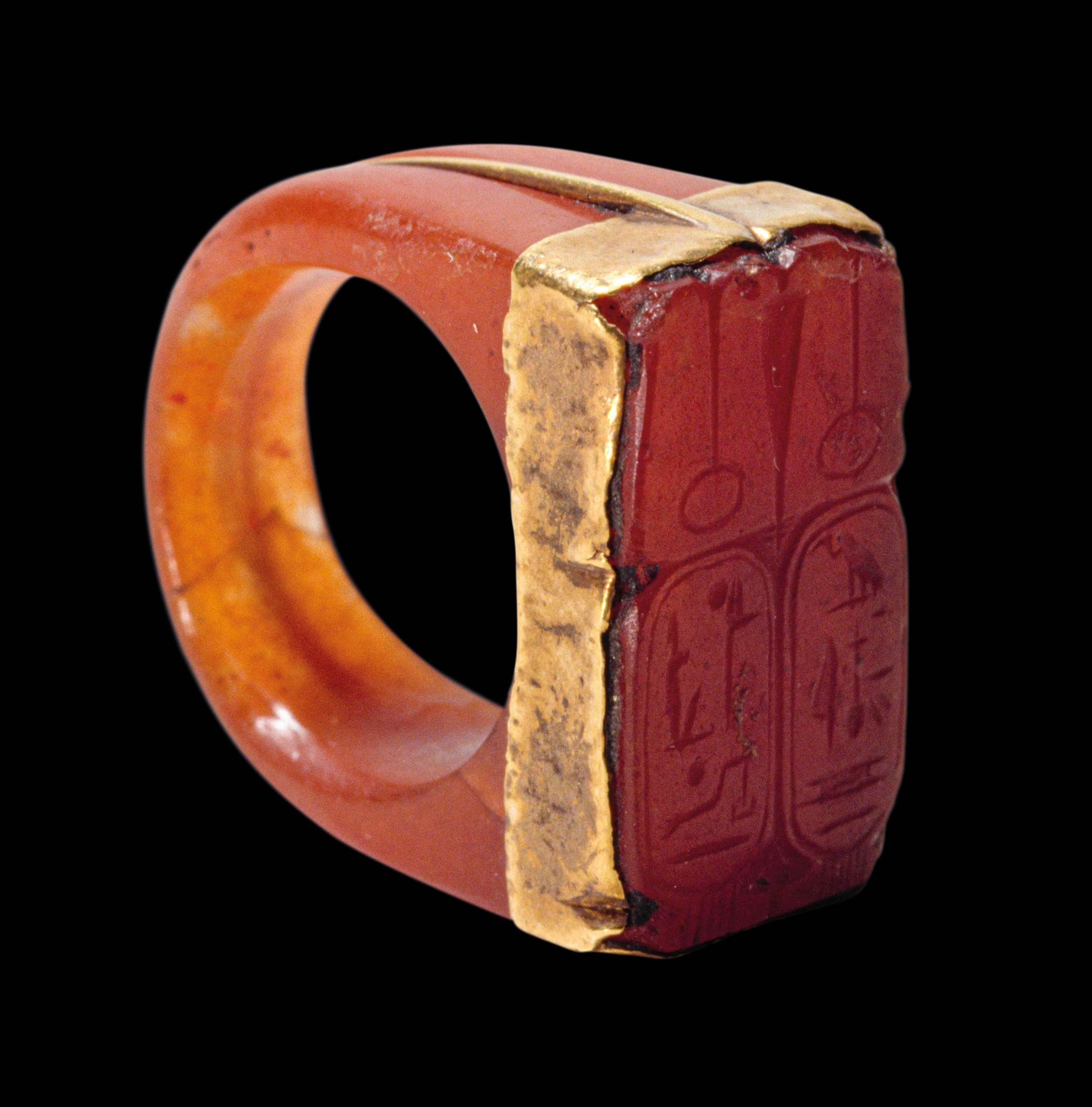 This gold and carnelian ring is incised with cartouches bearing the names of Ramses II and Nefertari, his great royal wife.