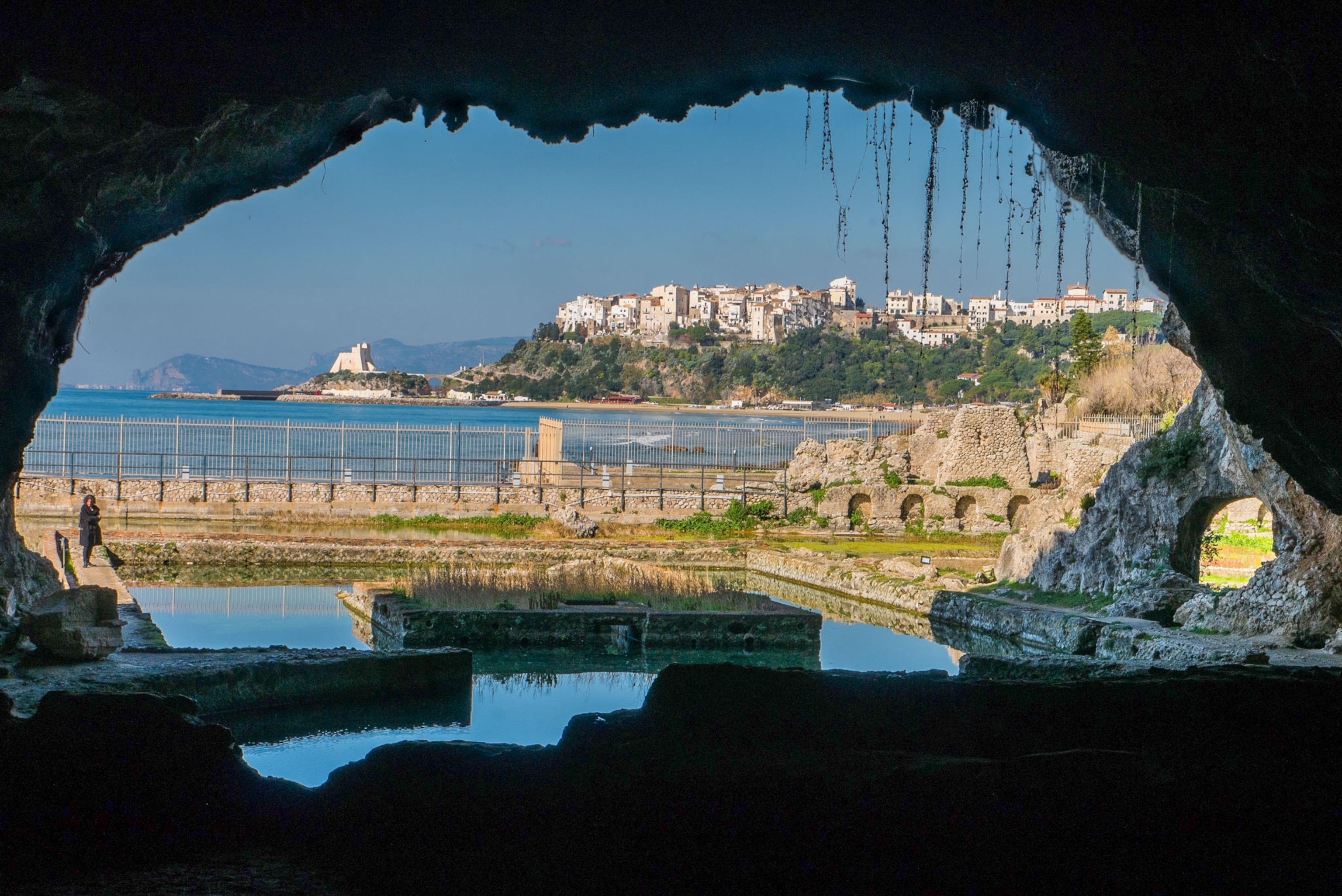 view of the ocean as seen from a cave in Italy