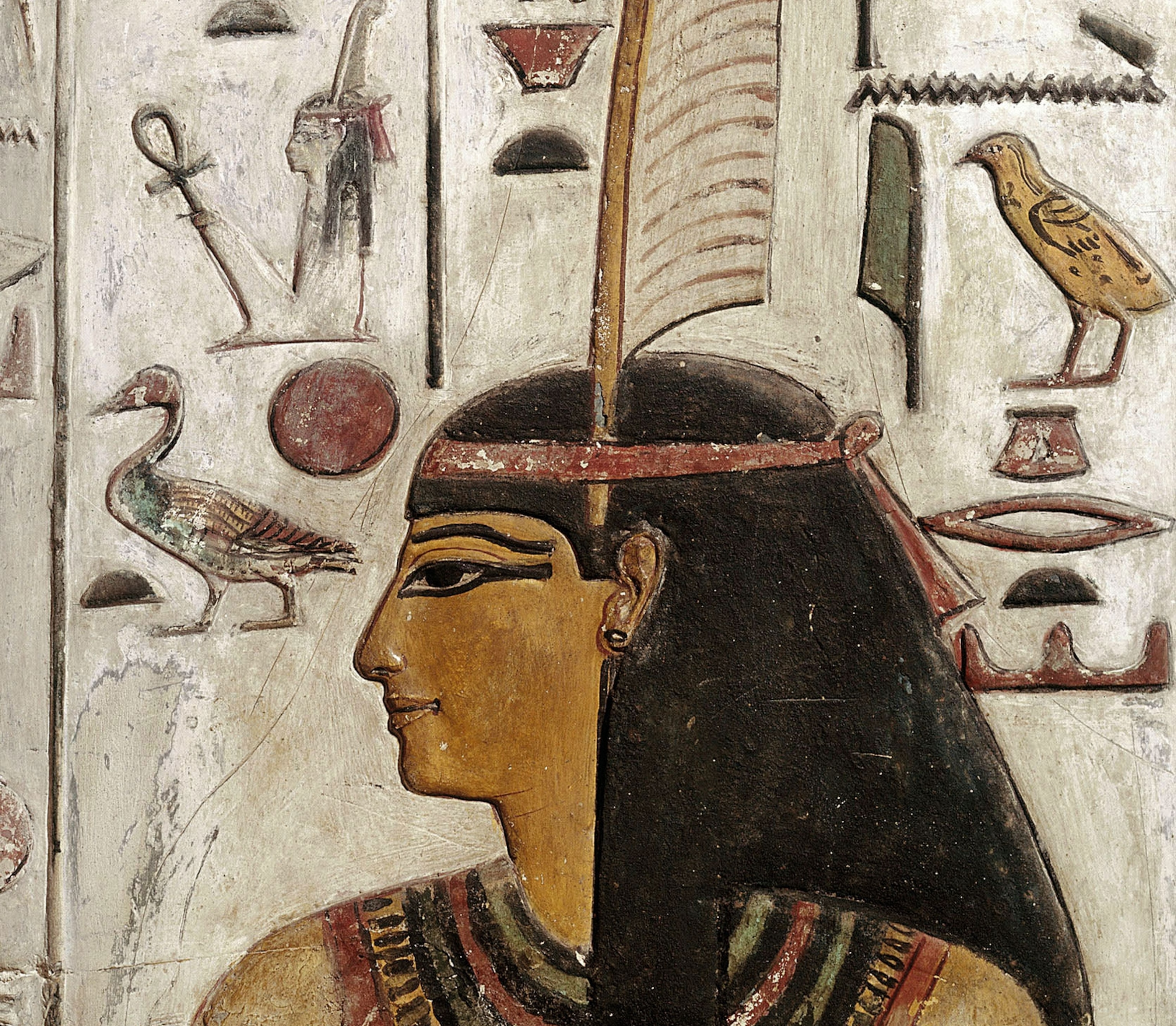 A bas-relief from the New Kingdom shows Maat wearing her ostrich feather headdress