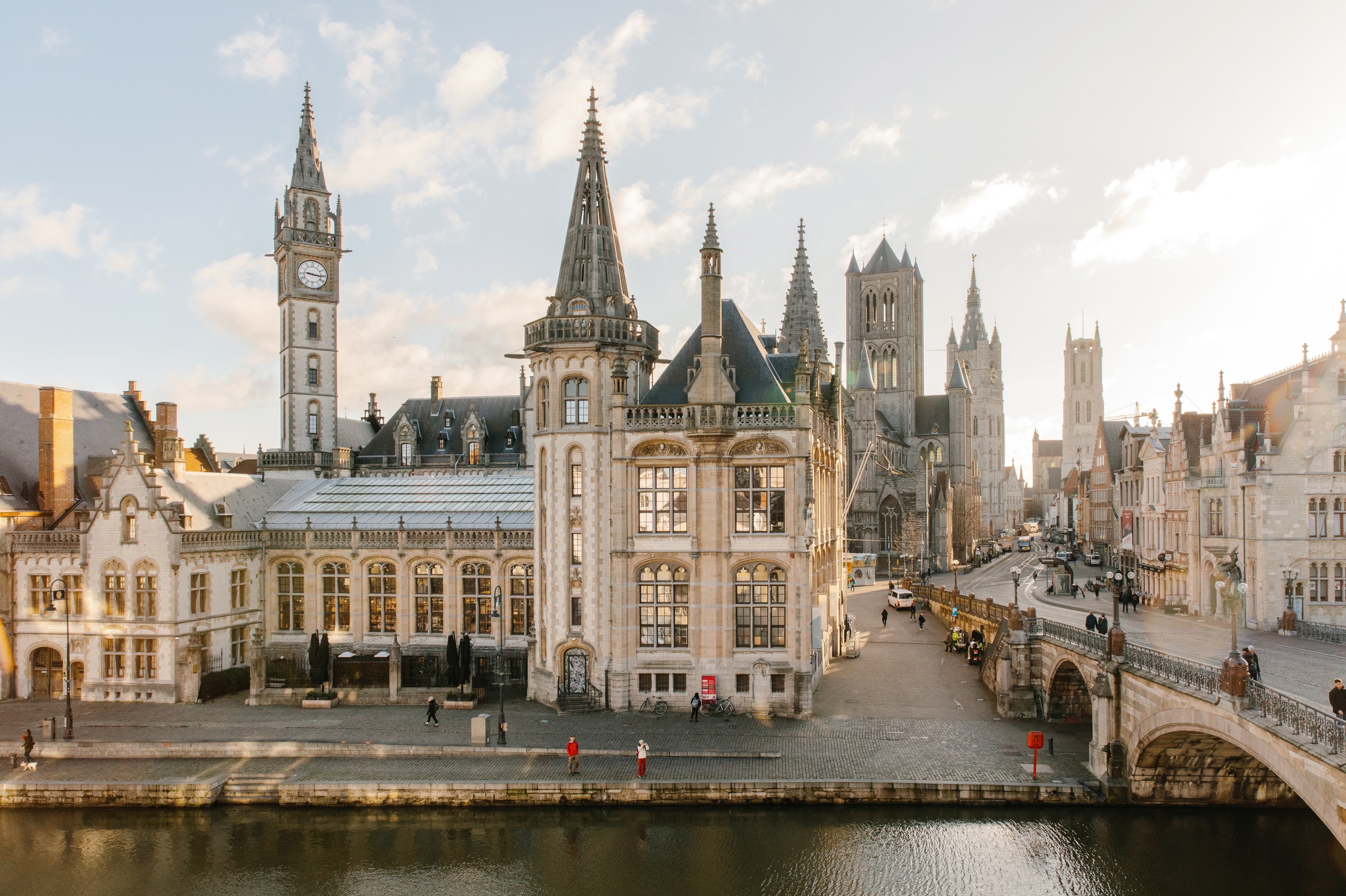 A view of Ghent's three towers of the Belfry, St Nicholas' Church and St Bavo's Cathedral from St Michael's Bridge.