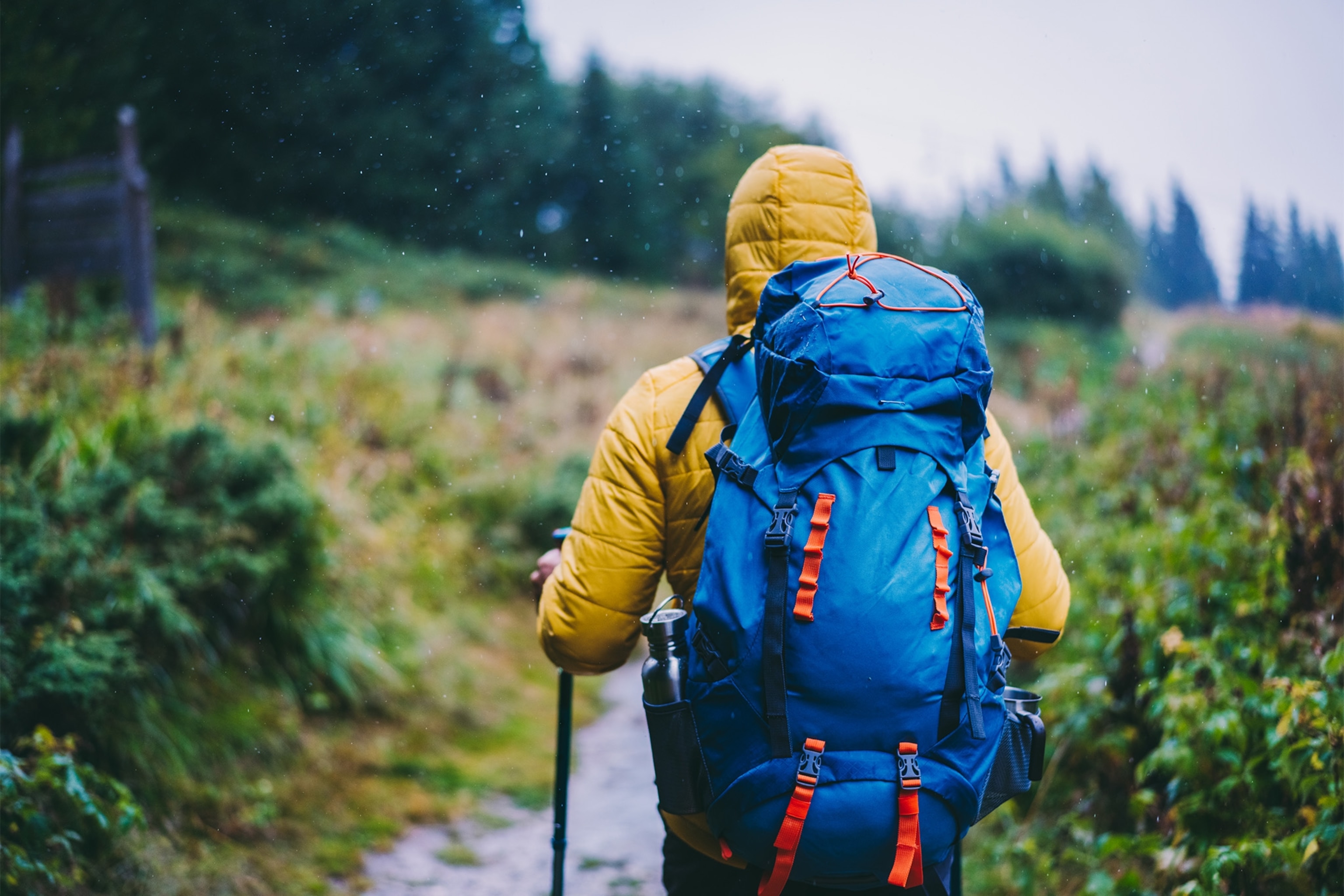 a hiker in rain