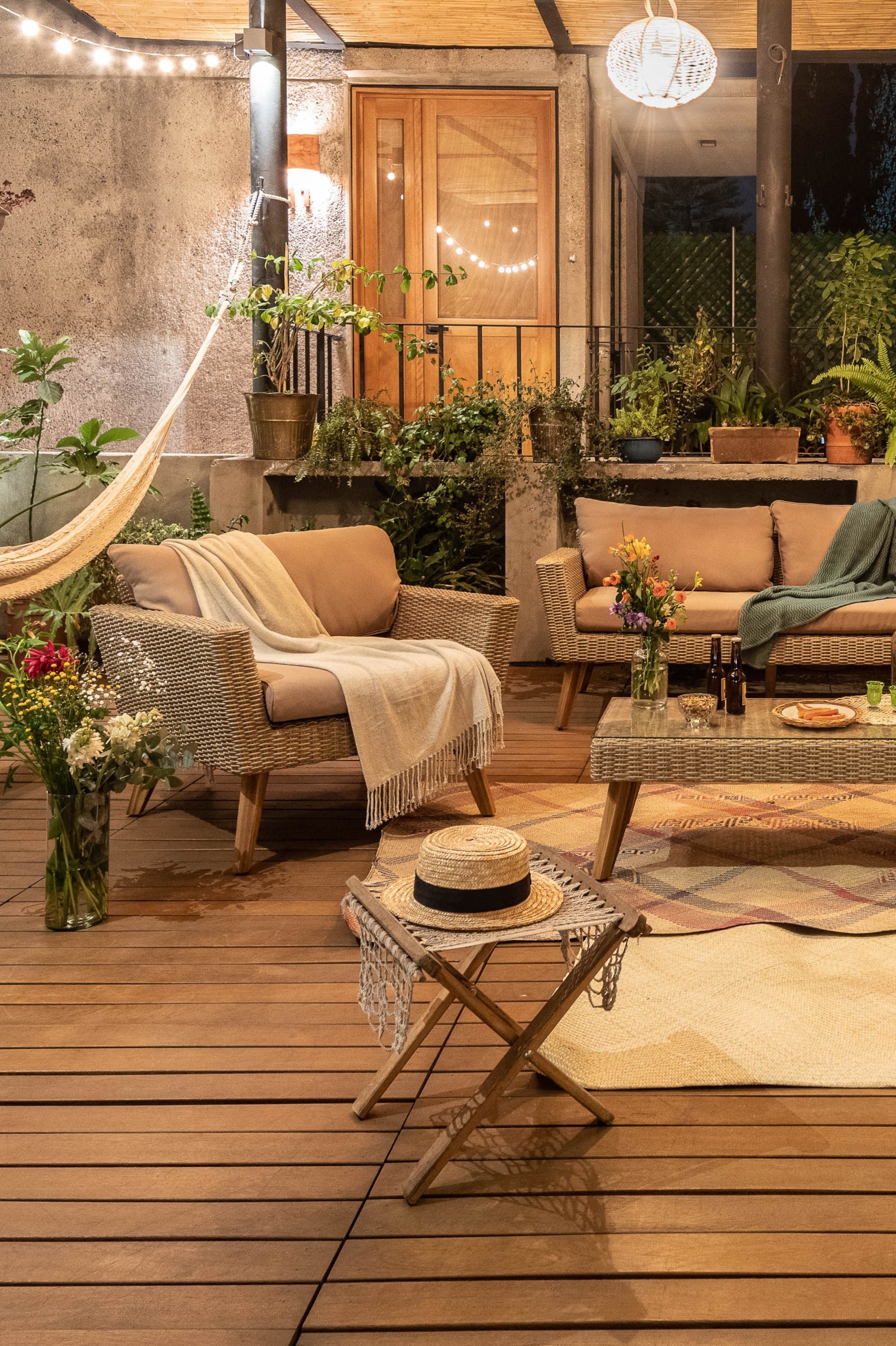 Casa Tuna's rooftop terrace is strung with hammocks and scattered with wicker chairs.