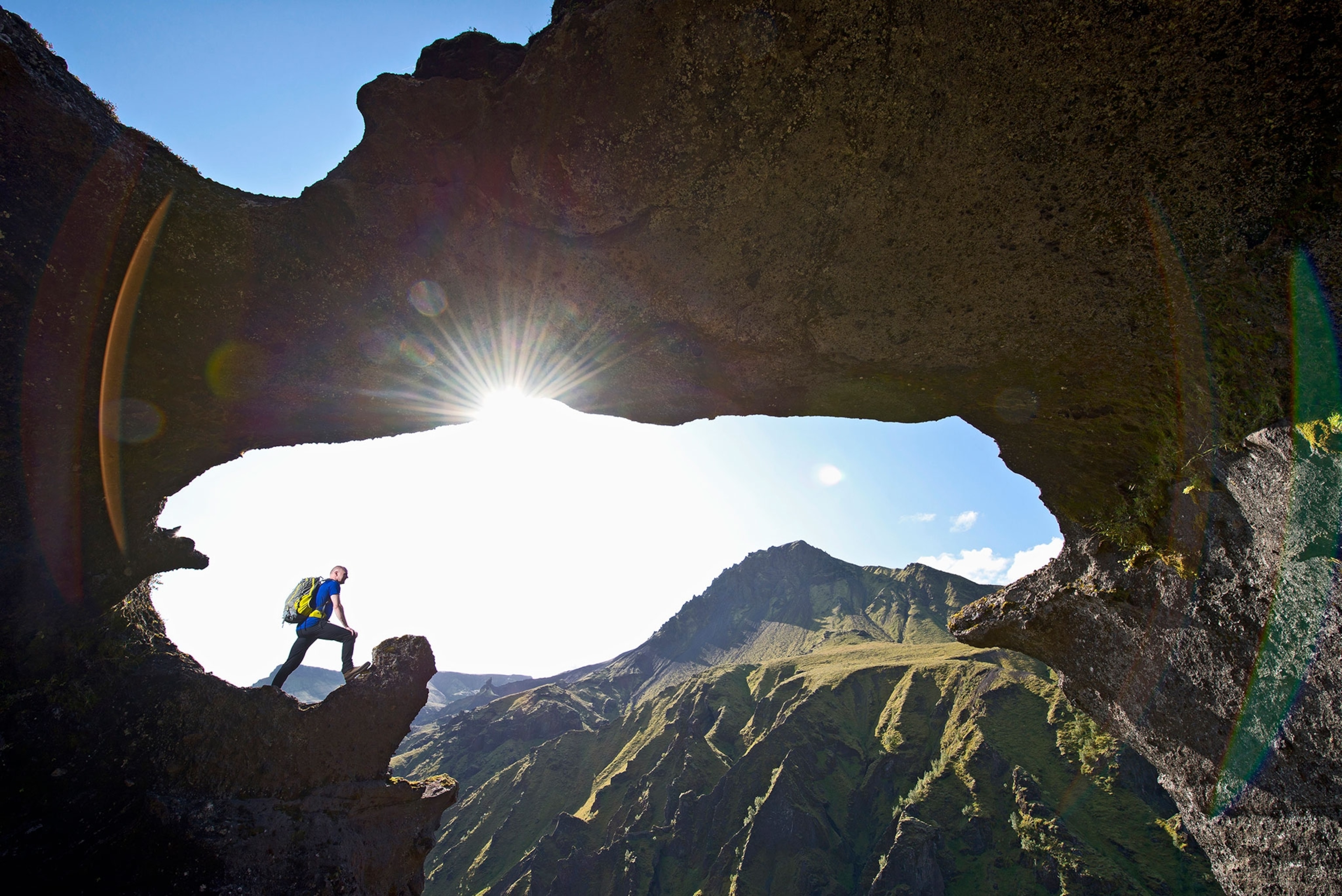 a hiker on the way up Fimmvordurhals Pass, Iceland