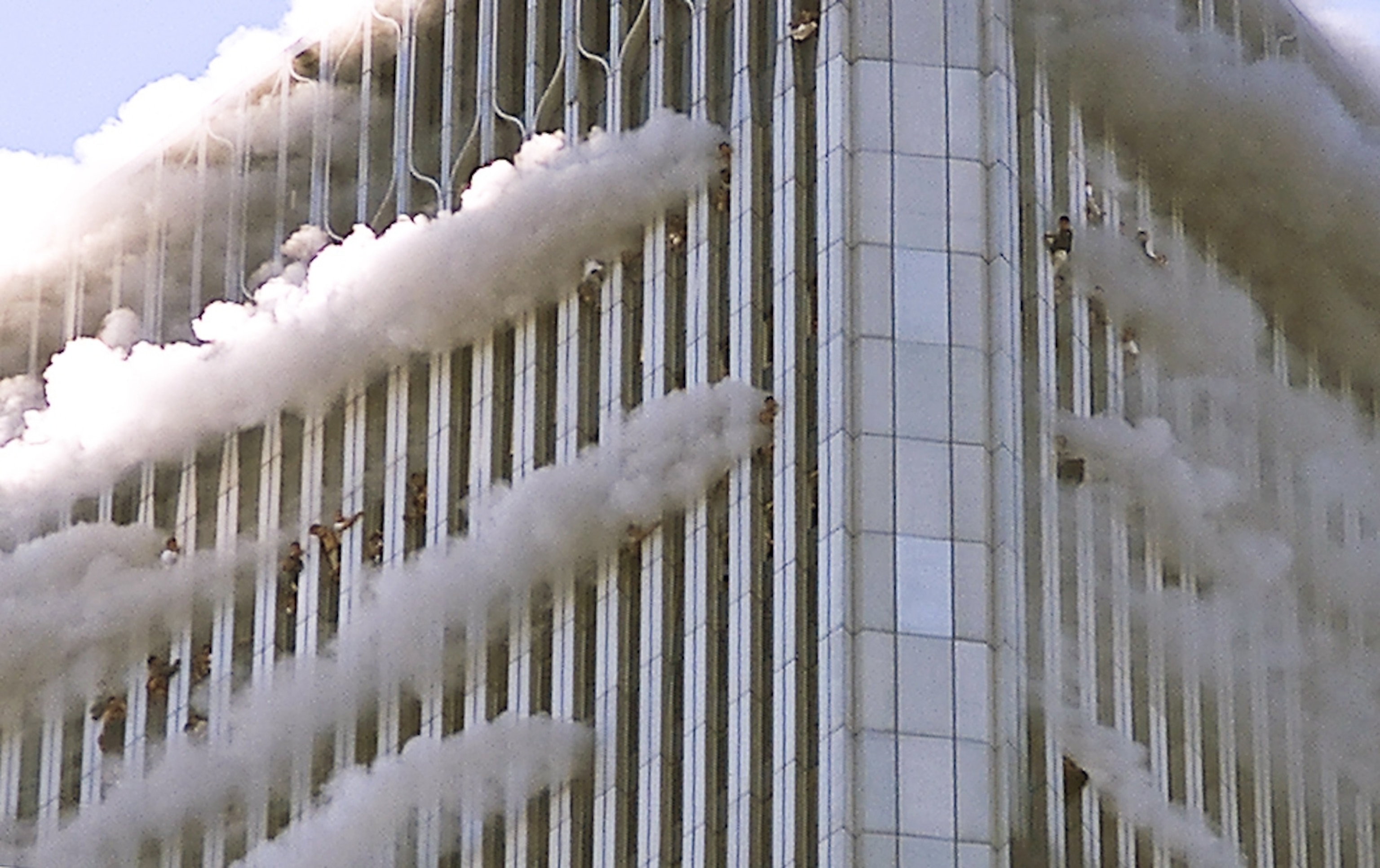9/11 picture: people on the World Trade Center's north tower hanging out of the windows
