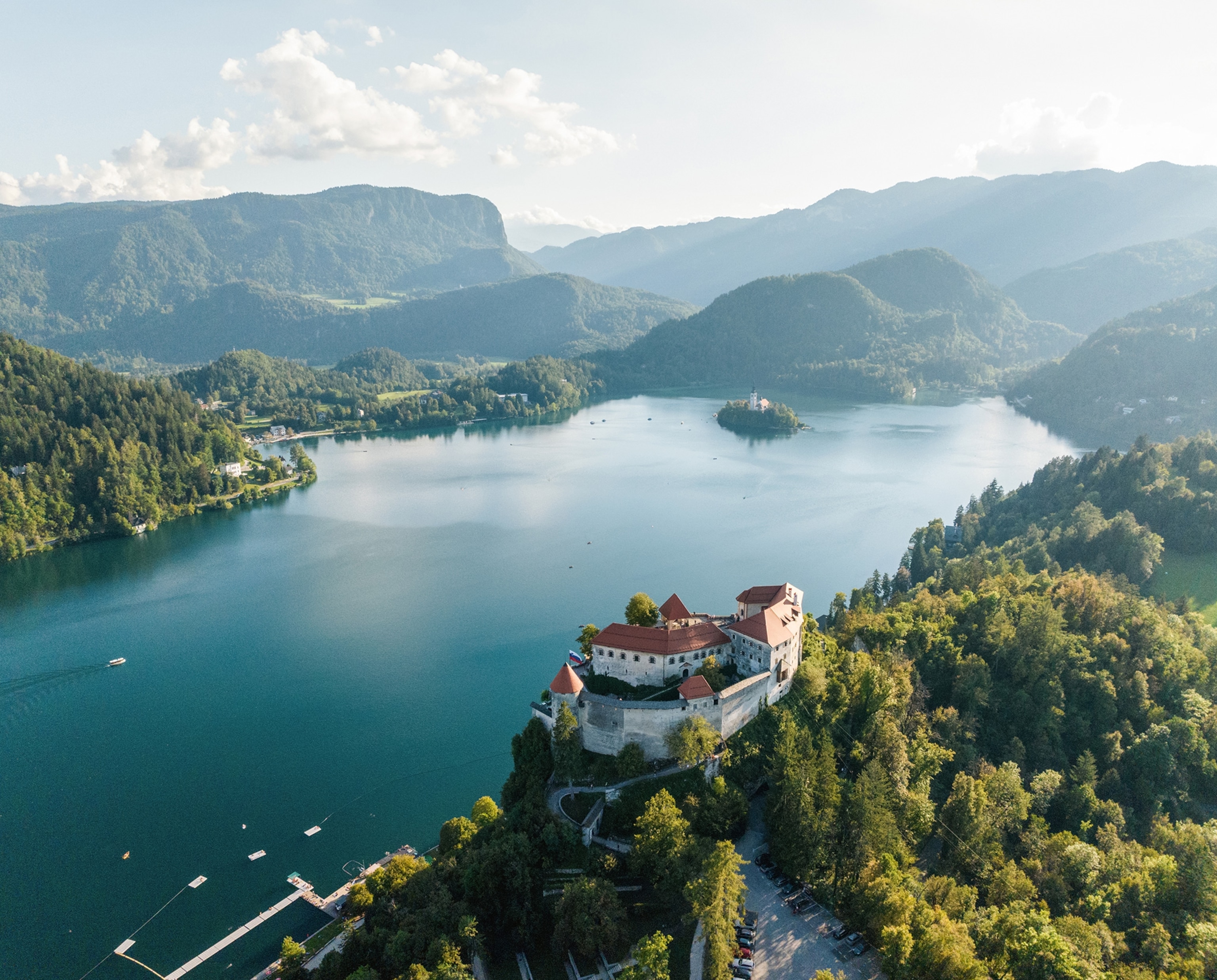 Aerial view over Bled Castle and Lake Bled in the back with the island.