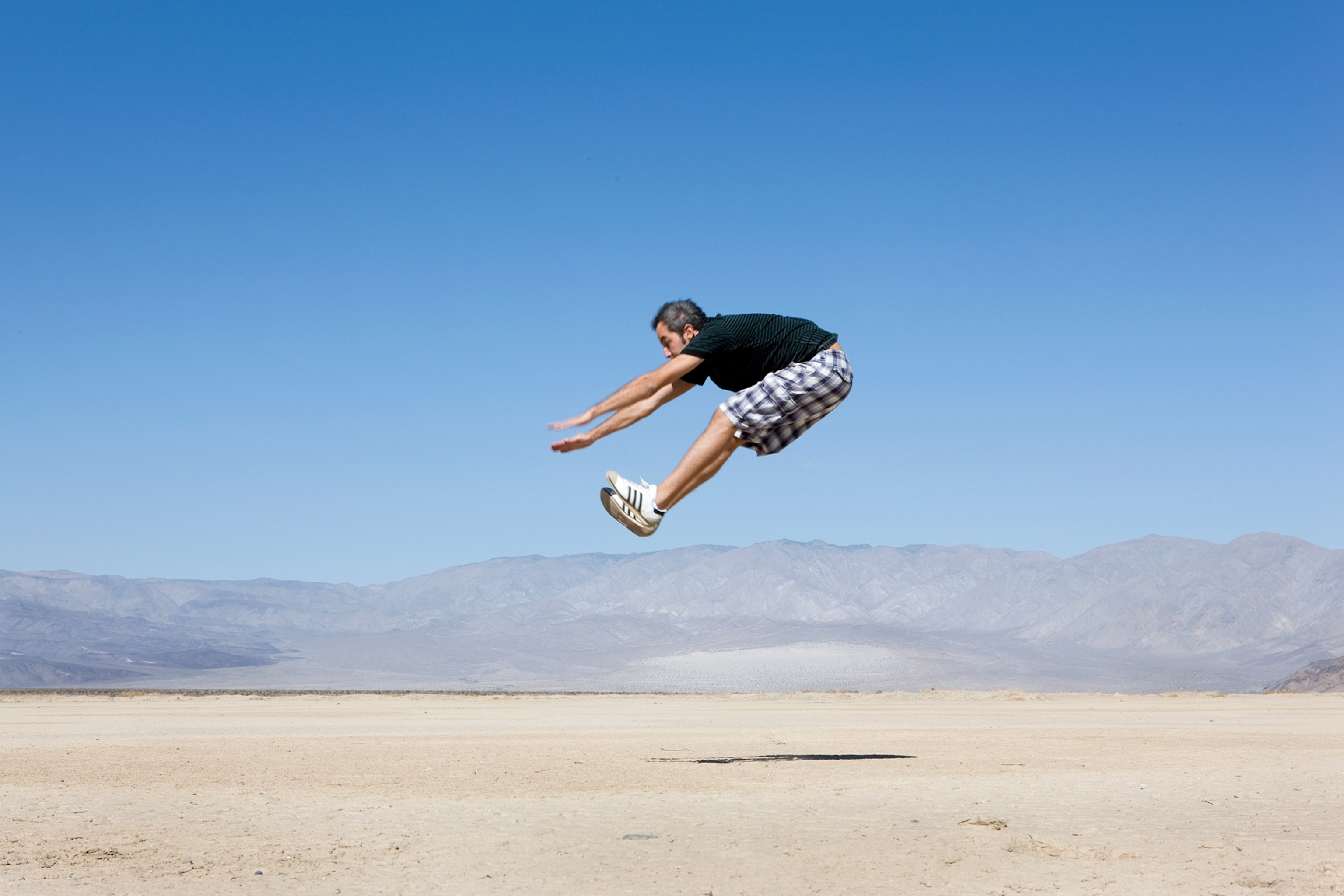 photographer Gabriele Galimberti jumping in Death Valley