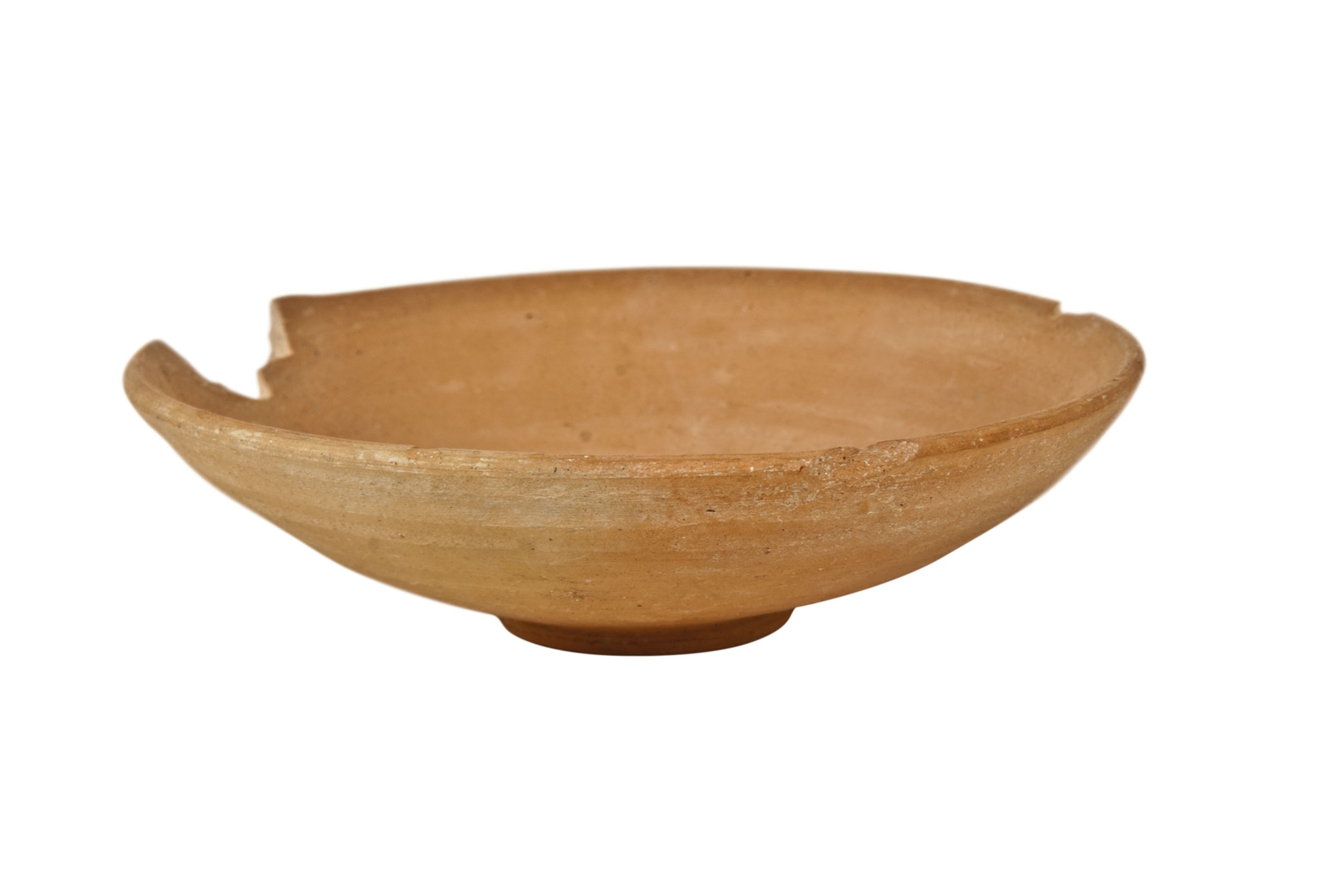 A tan flat wide bowl