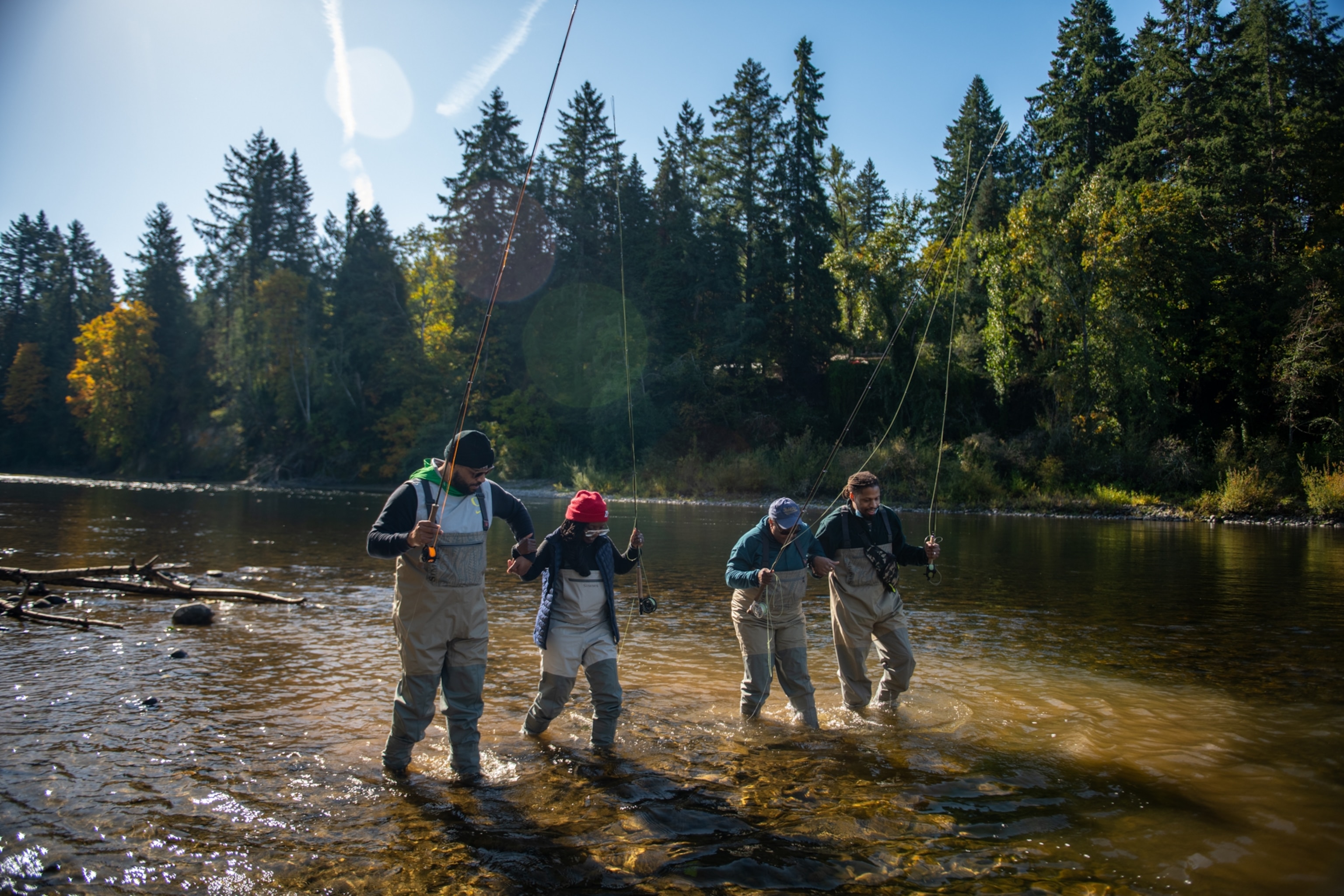 Picture of a group of fishers wading through the Clackamas River.