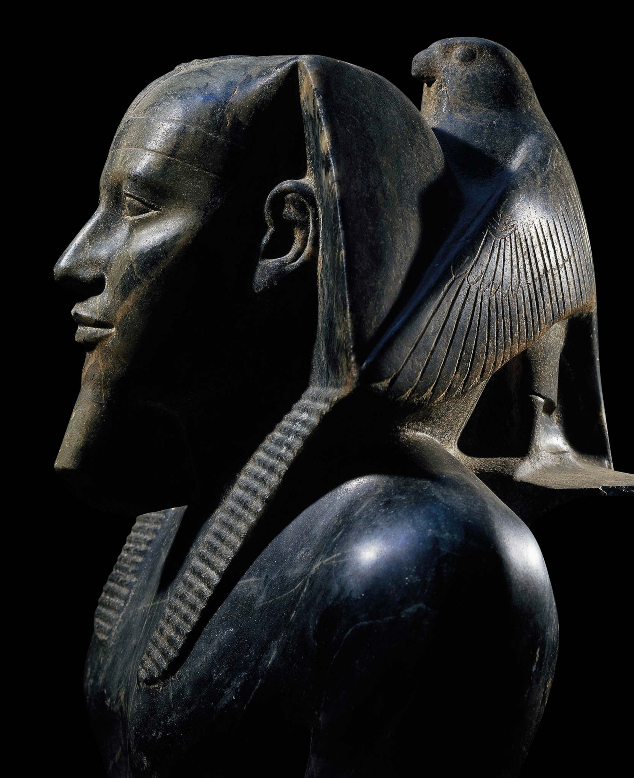 A diorite statue of the pharaoh Khafre protected by the falcon god Horus