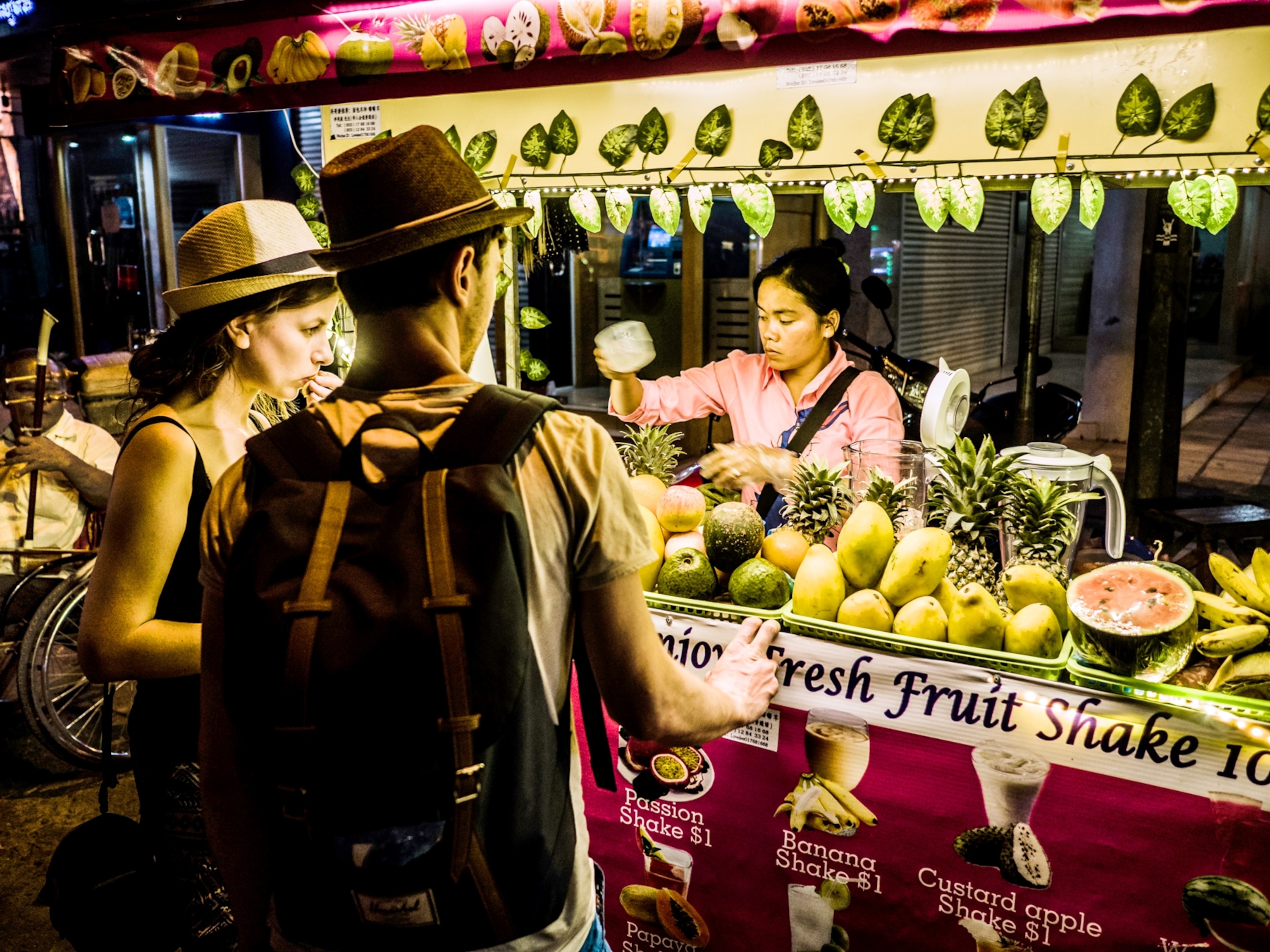 a fruit vendor in Cambodia