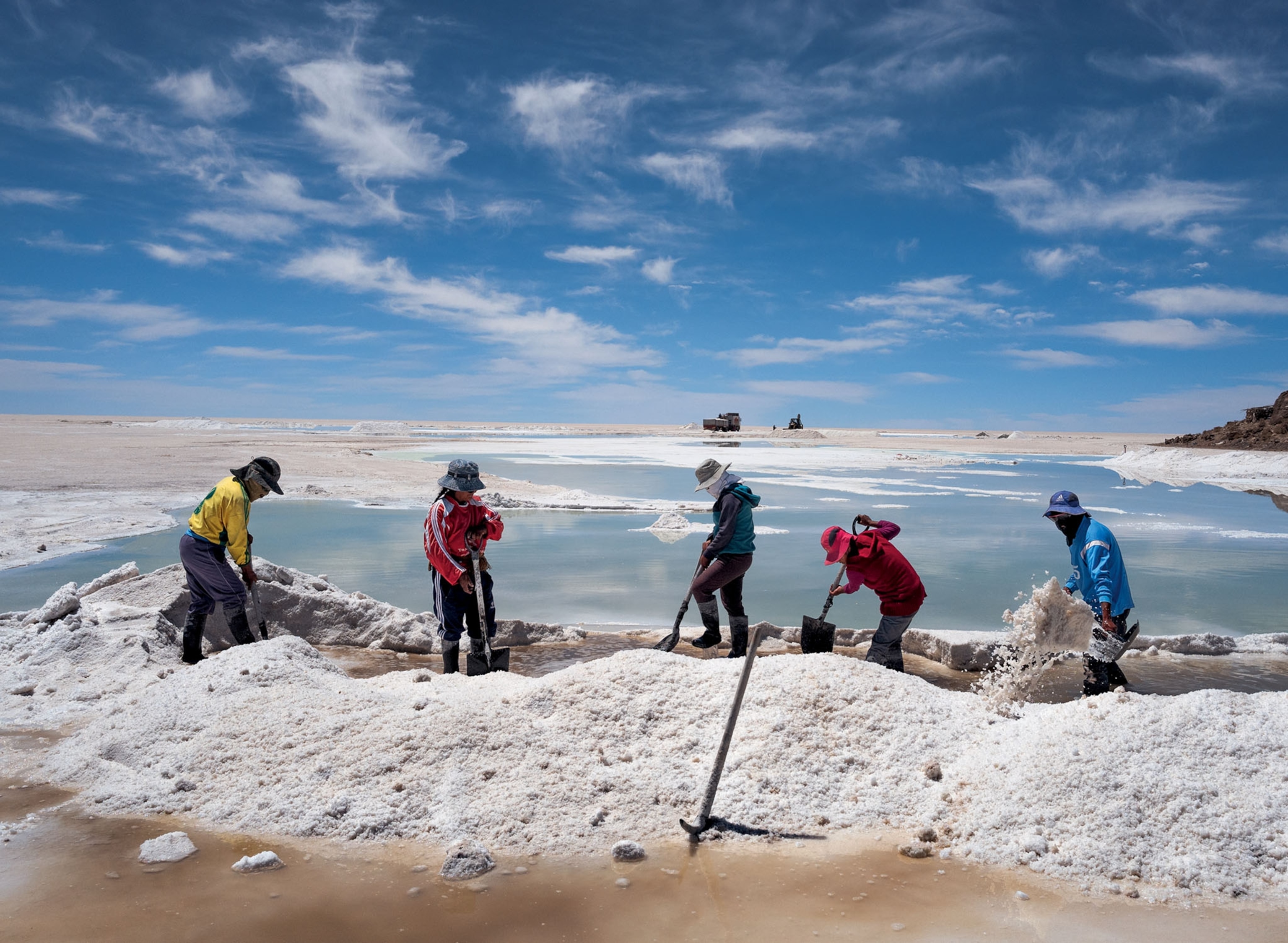 people digging in salt