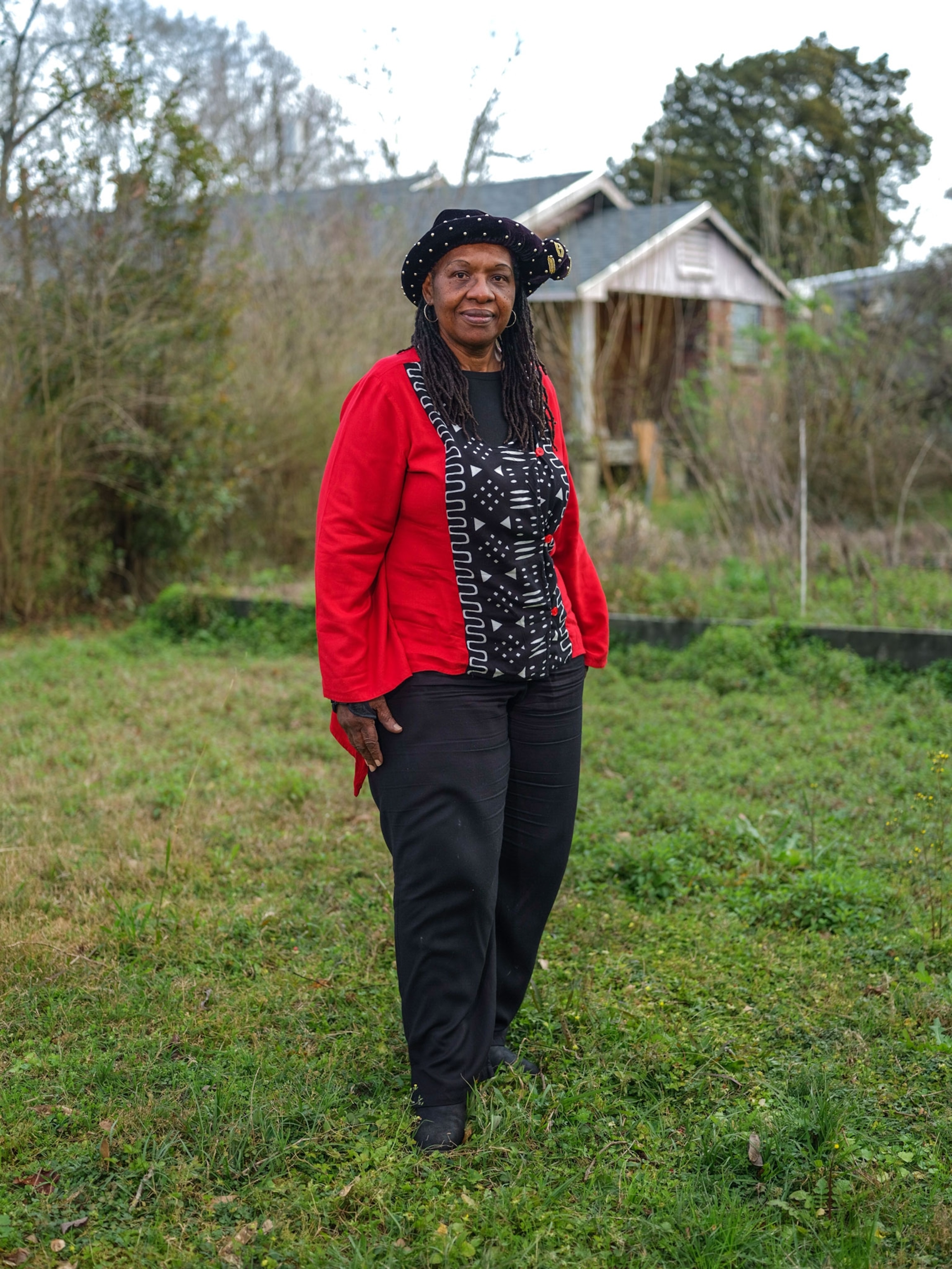 a woman standing for a portrait