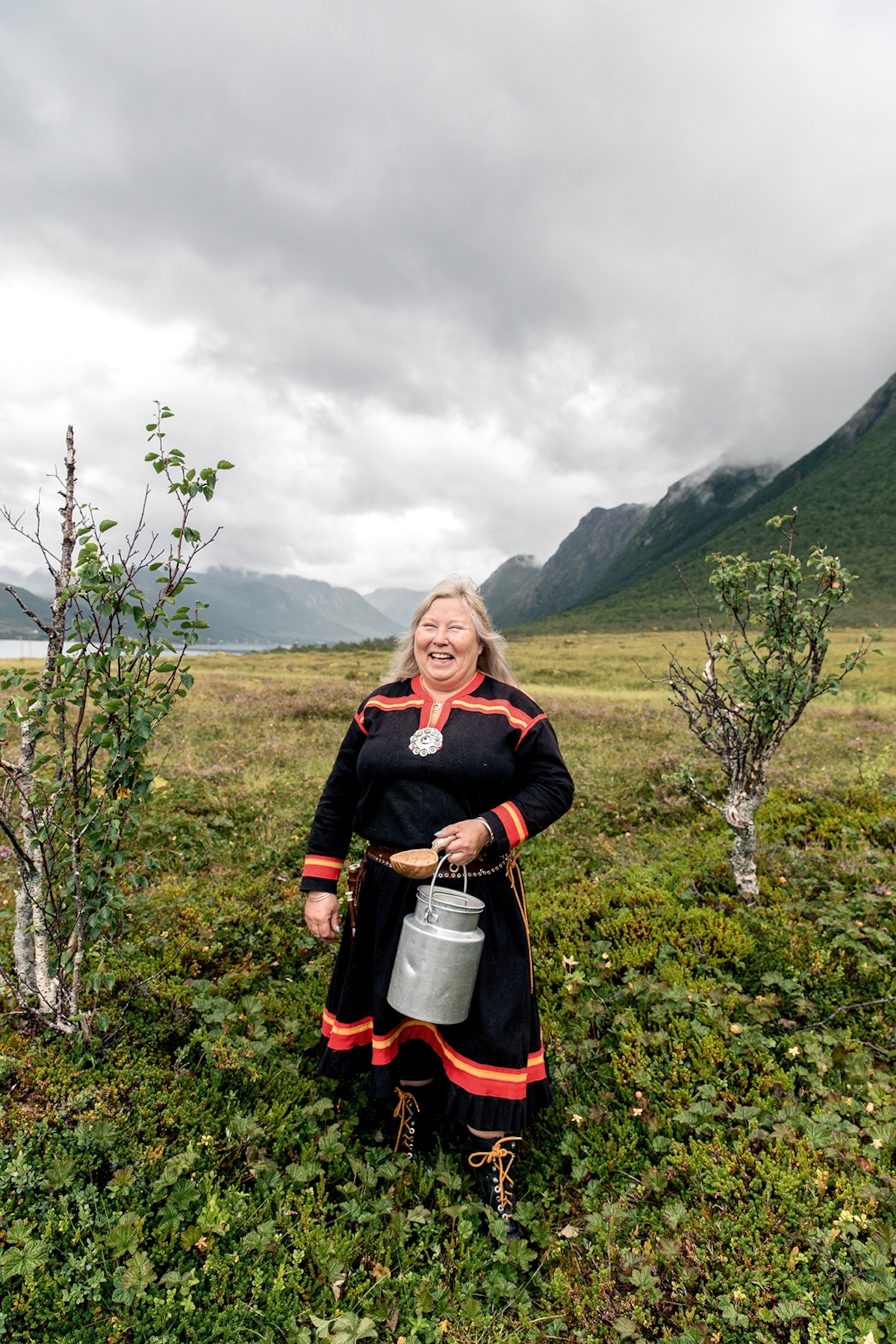 a woman standing in a field