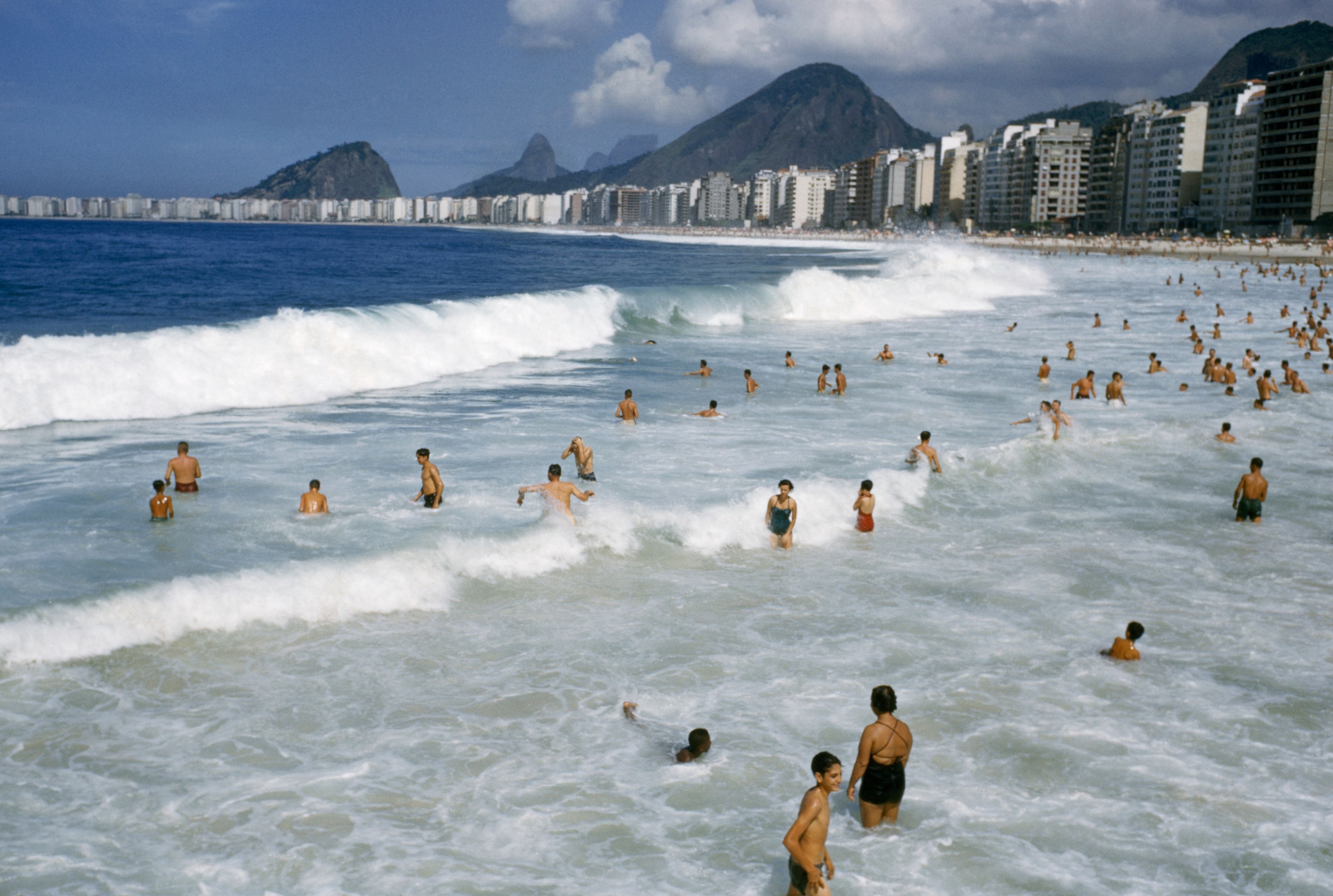 swimmers on a beach in Rio de Janeiro, Brazil