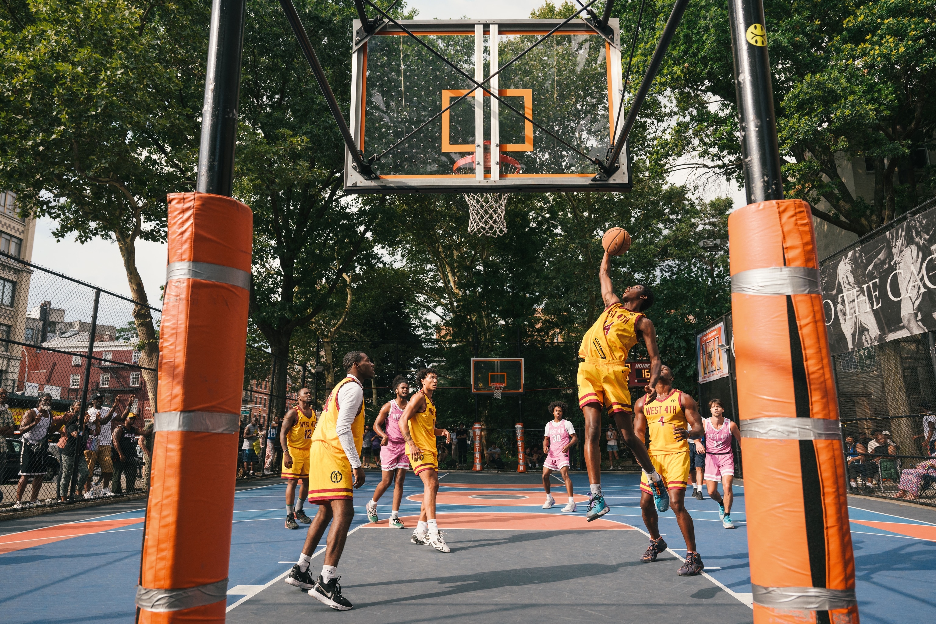 man mid-shot in basketball tournament game