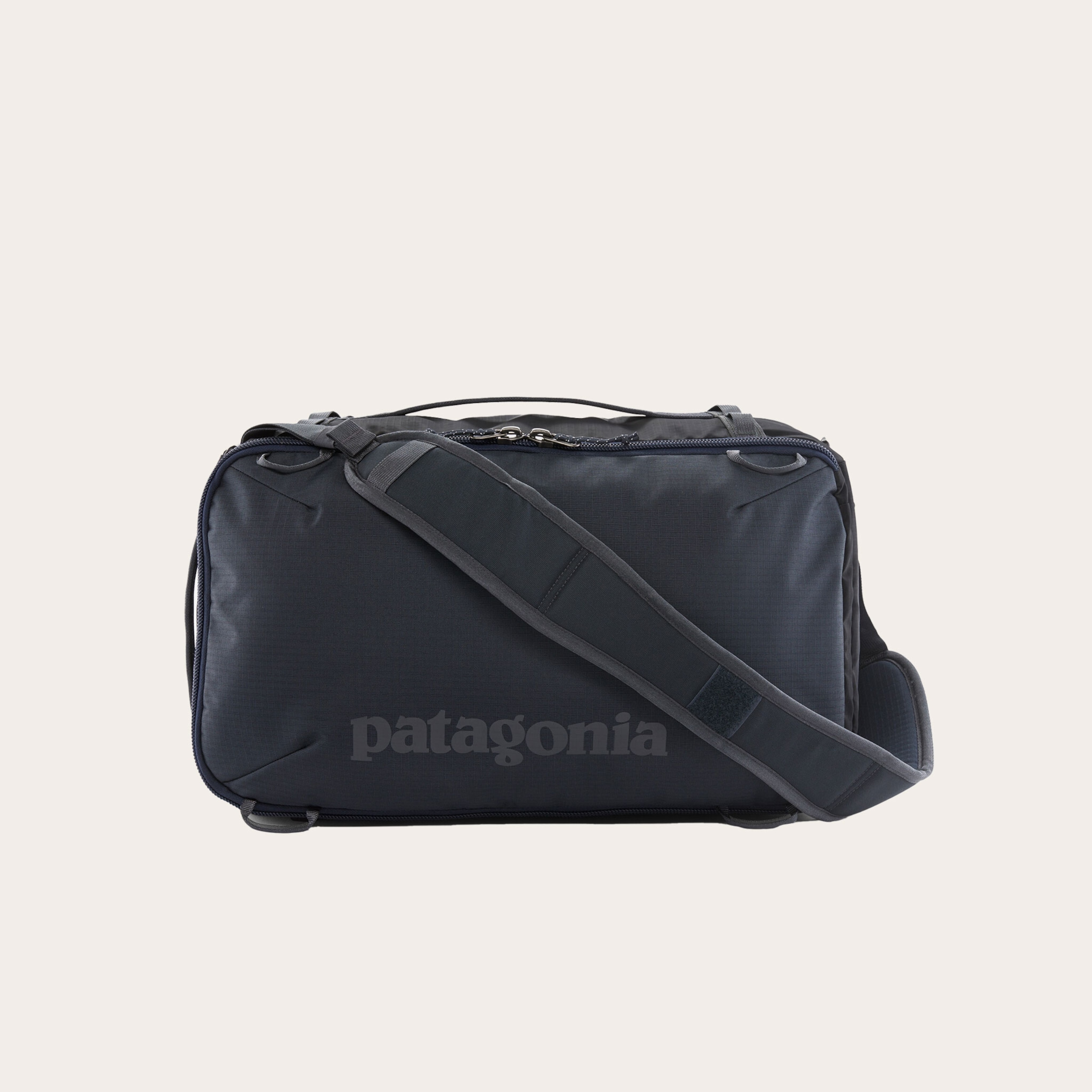 Black backpack with shoulder strap.