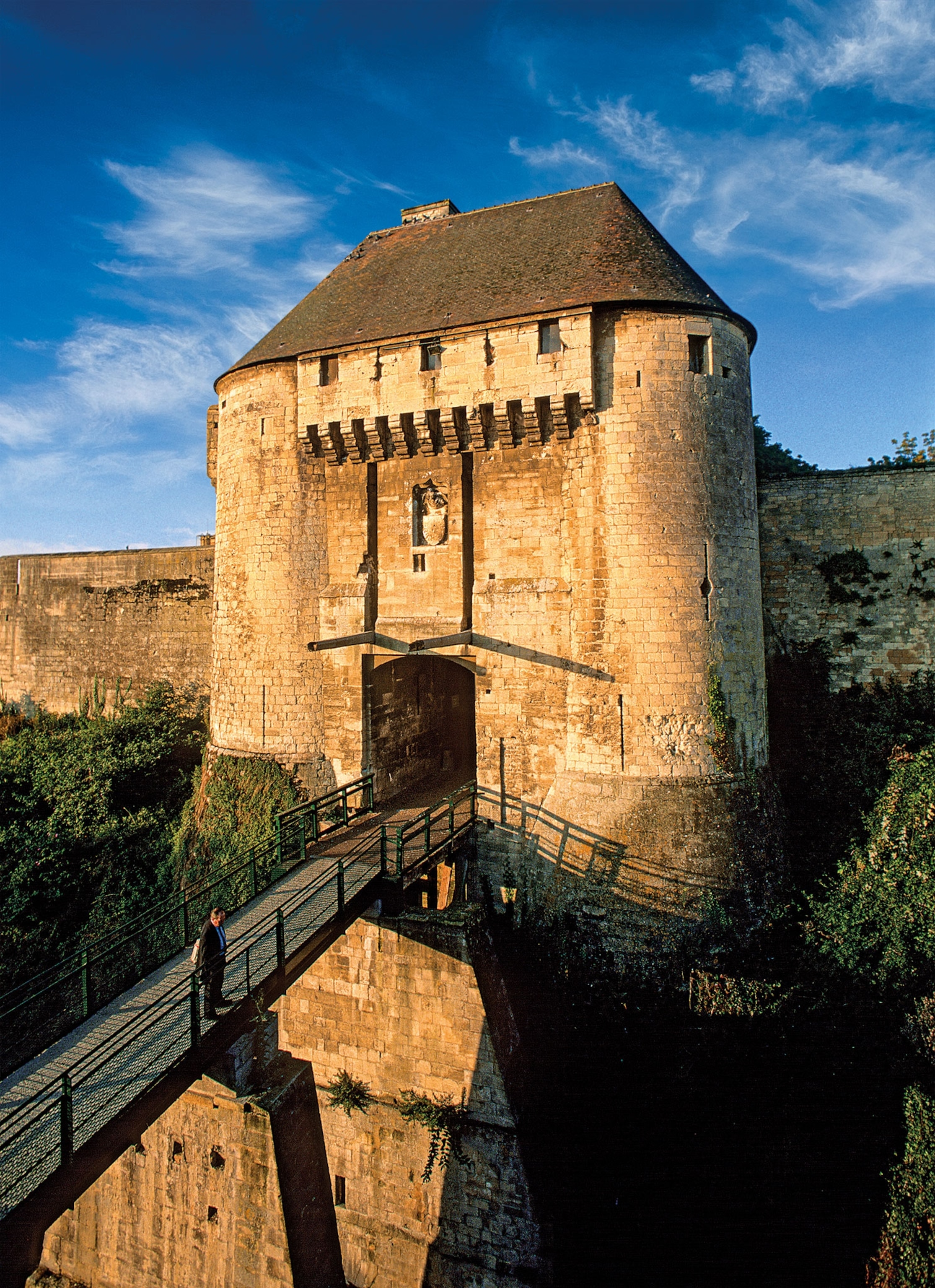A view of the entrance and bridge at a medieval castle
