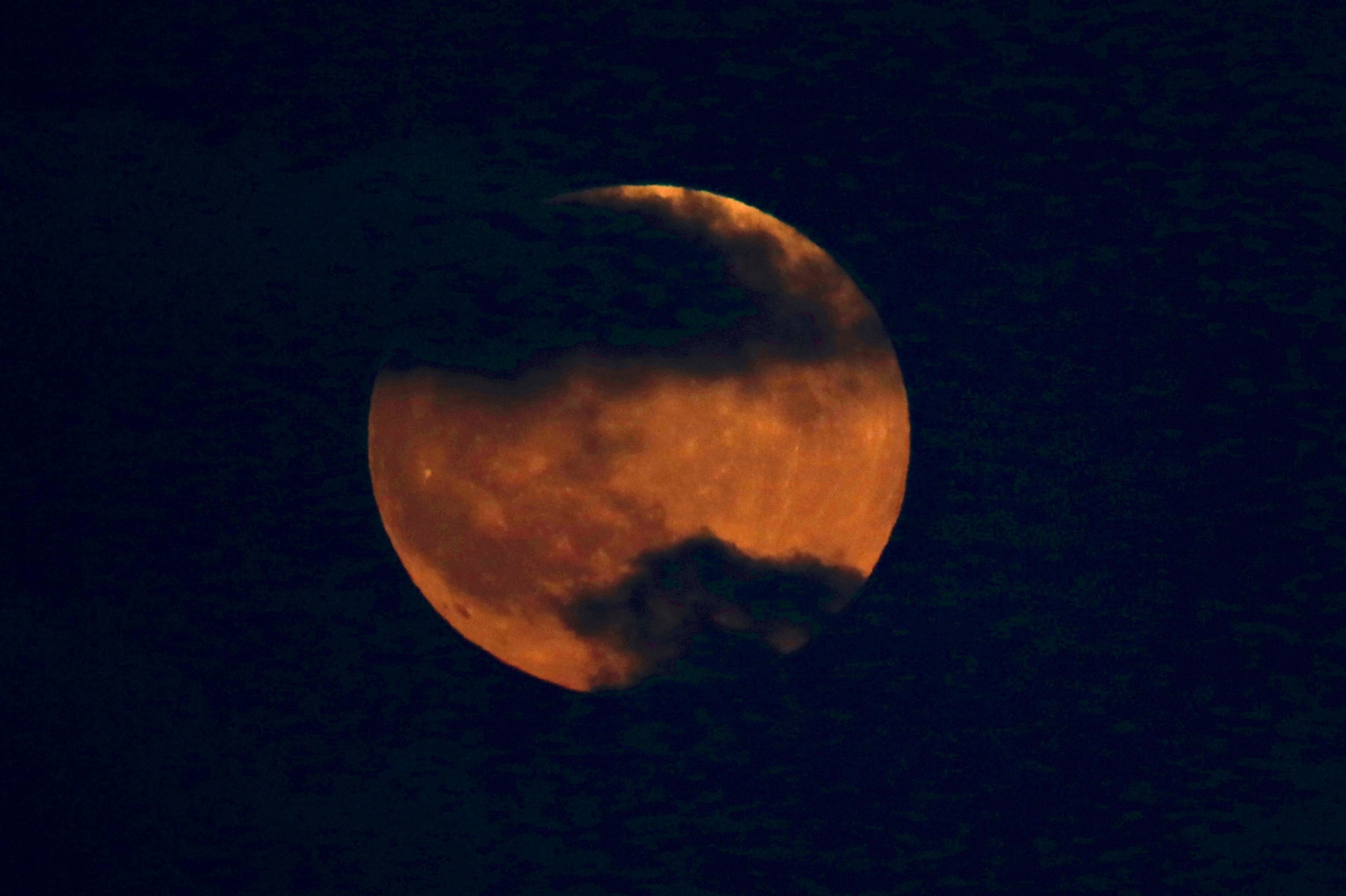 a blood moon rising over Tel Aviv, Israel