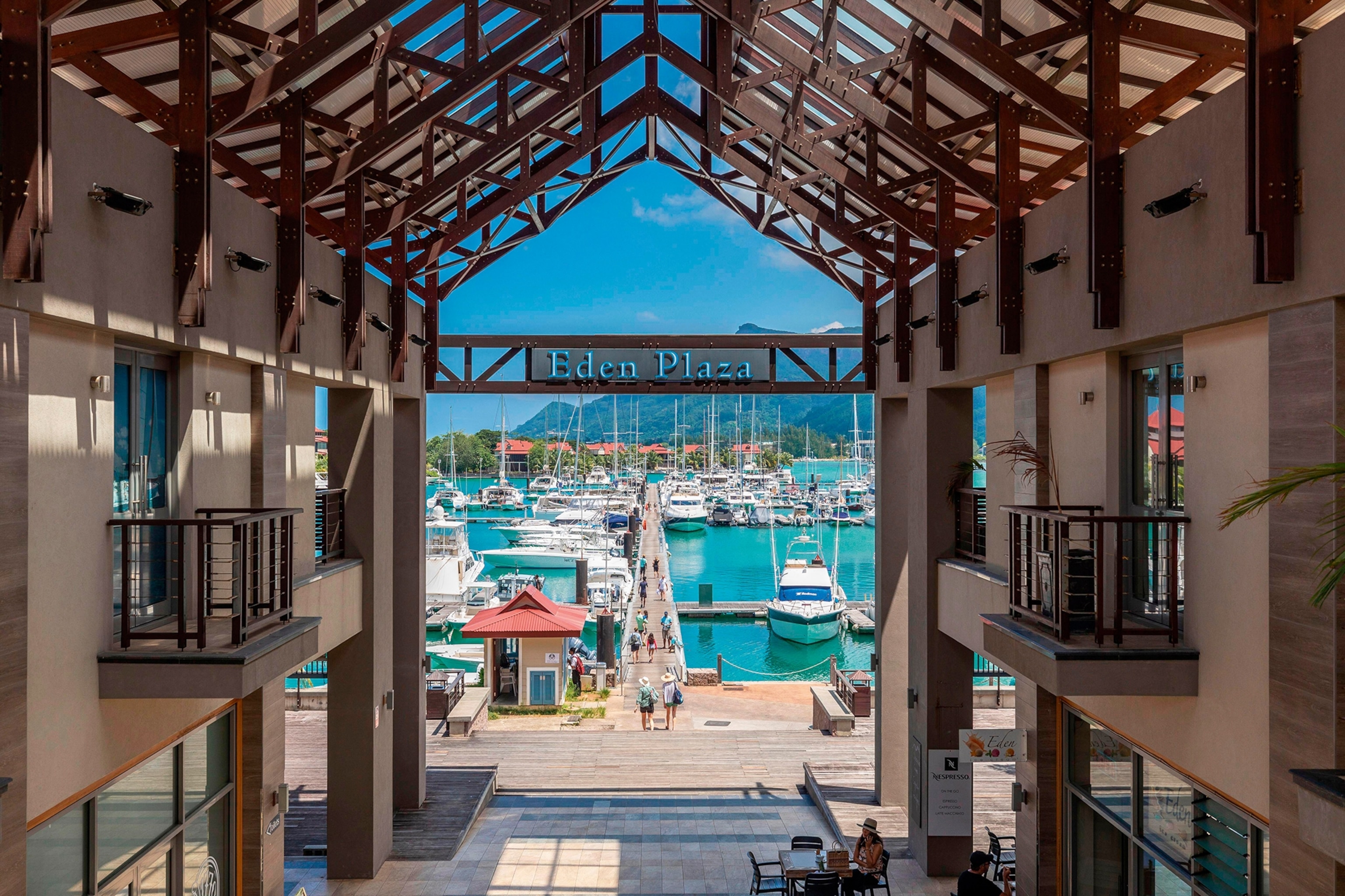 a large shopping place looking out onto a port