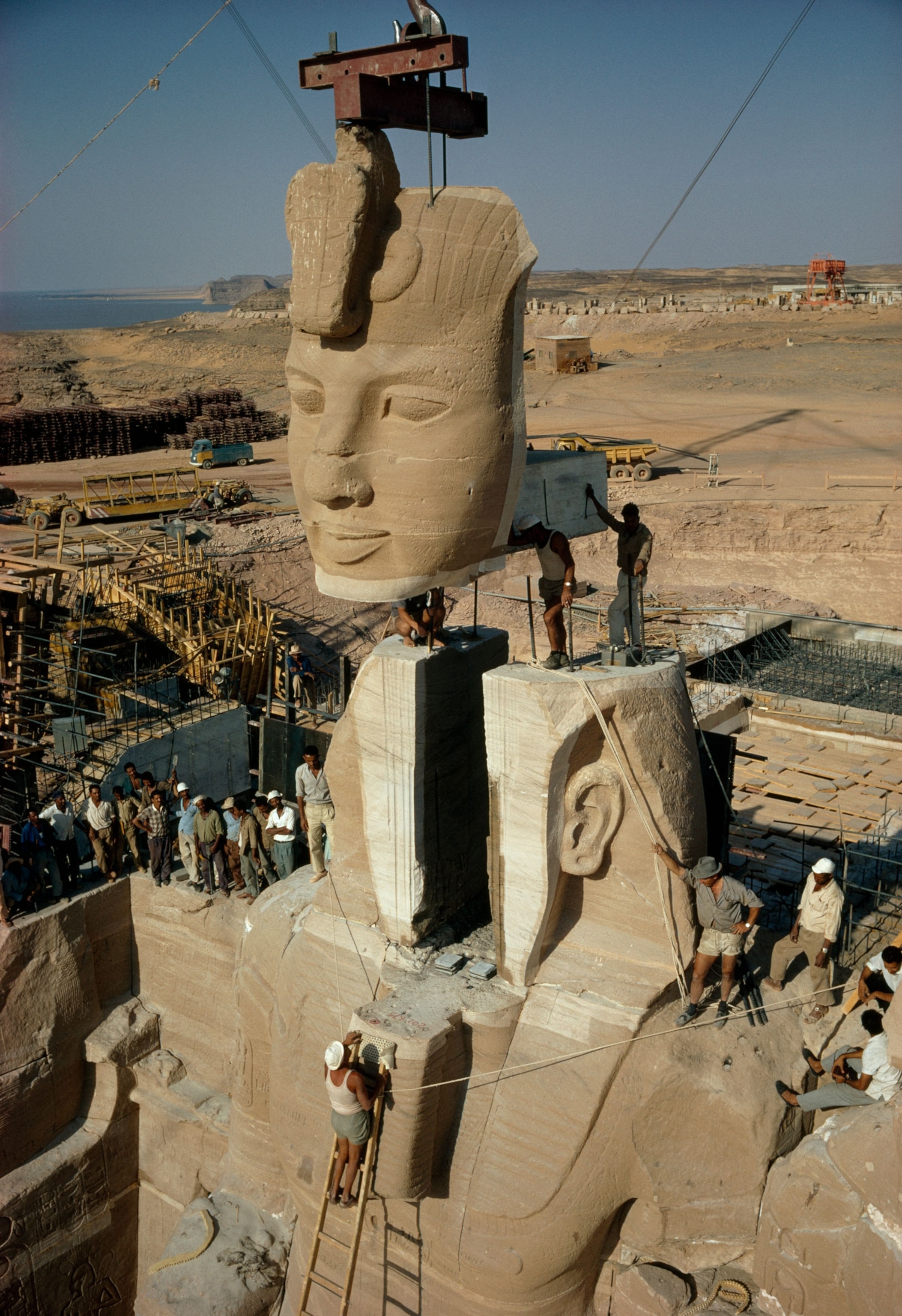 a statue of Ramses II being rebuilt after being dismantled for transport