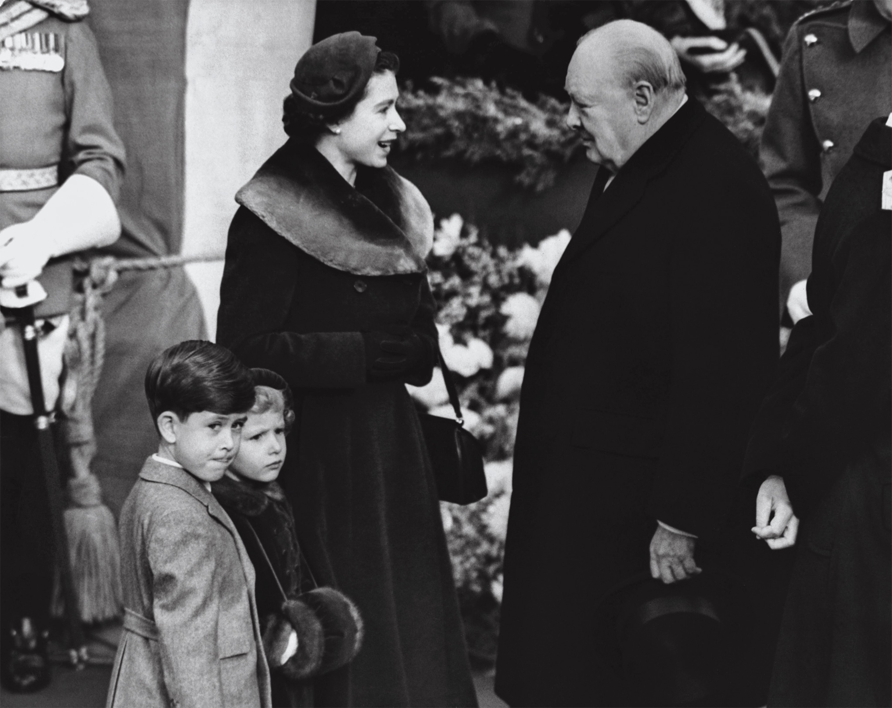 Prime Minister Winston Churchill, shown here conversing with Elizabeth, Charles, and Anne in 1953, shared a special relationship with the queen.