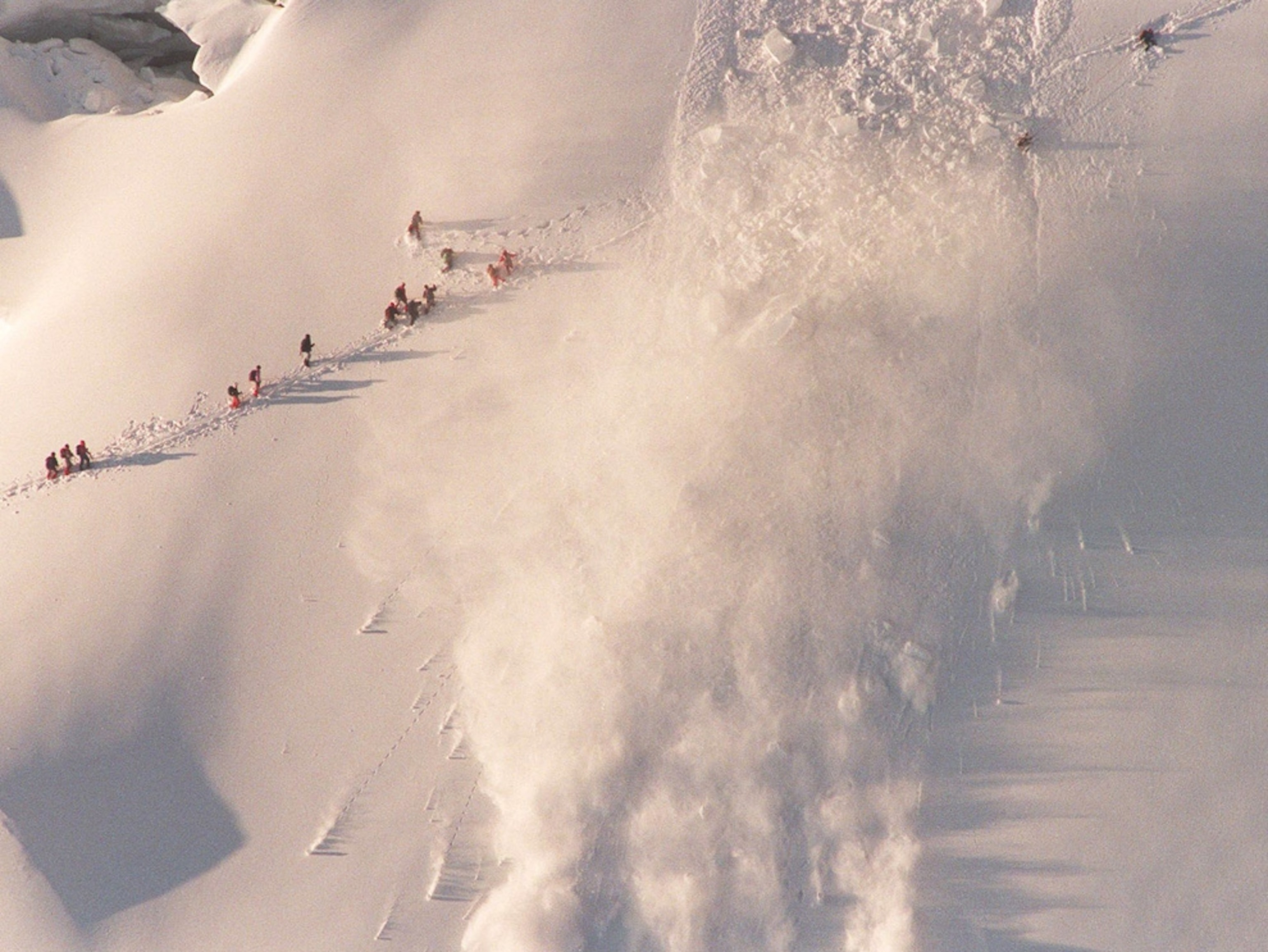A large avalanche on Mont Blanc separates climbers from others in their group