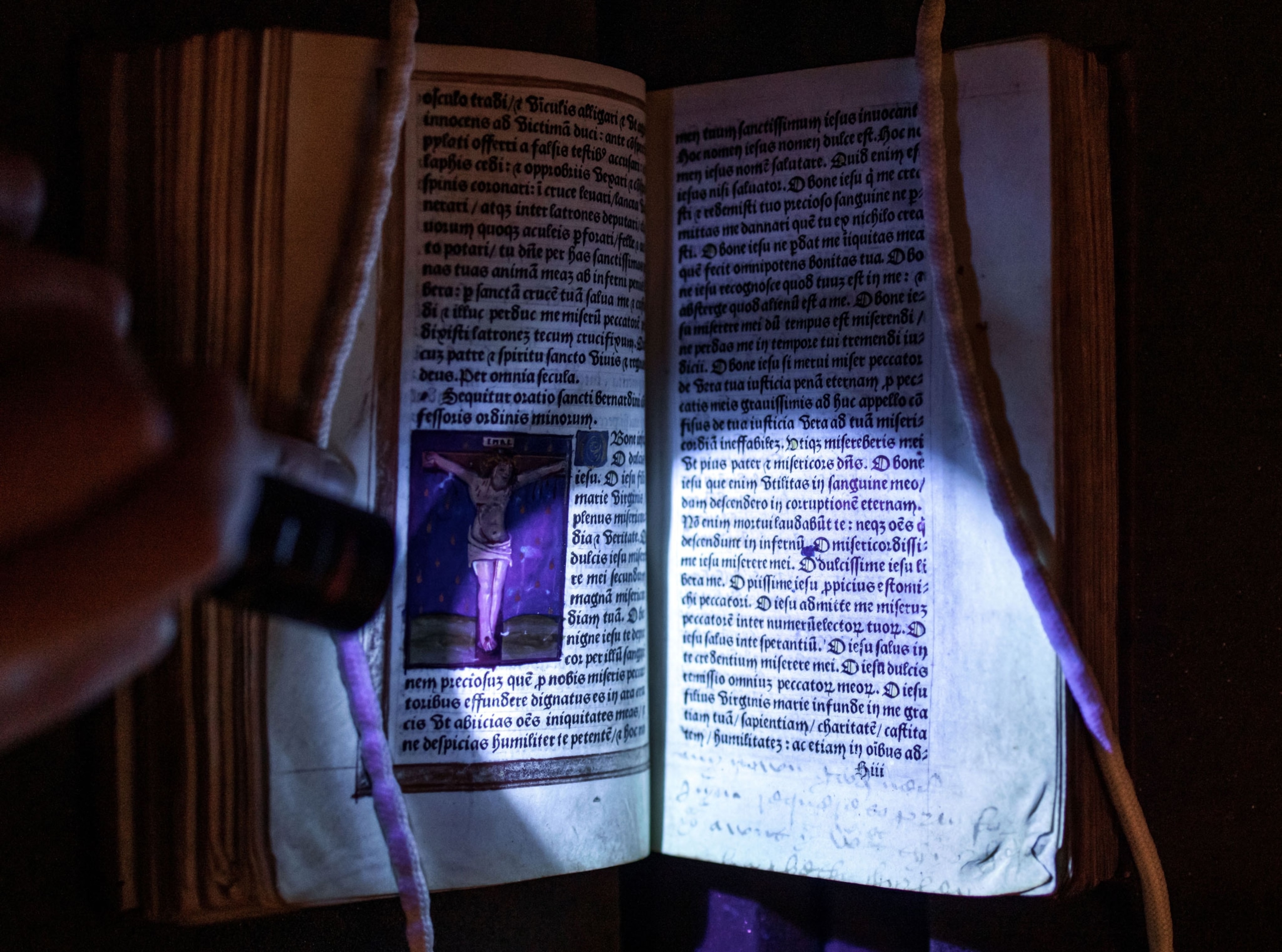 an ultraviolet light reveals erased words on Anne Boleyn's historic prayer book