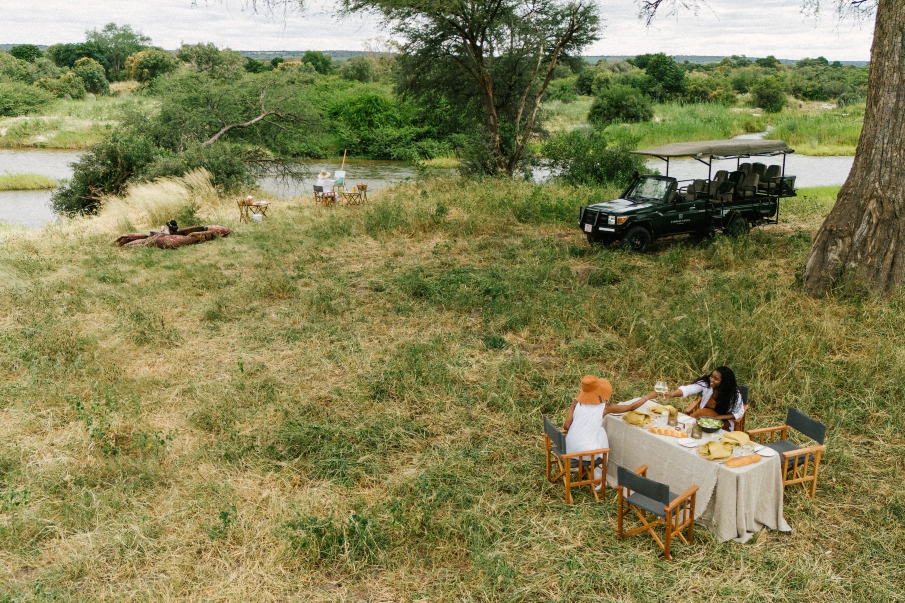 A top view of women dinning outdoors.