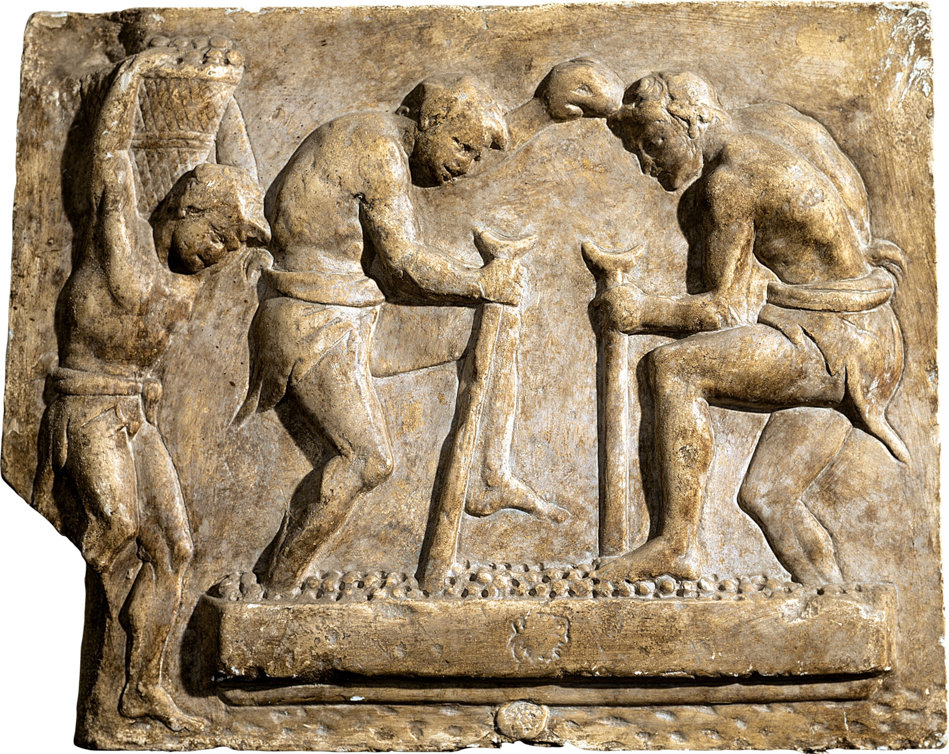 An engraving of men pounding and carrying stones