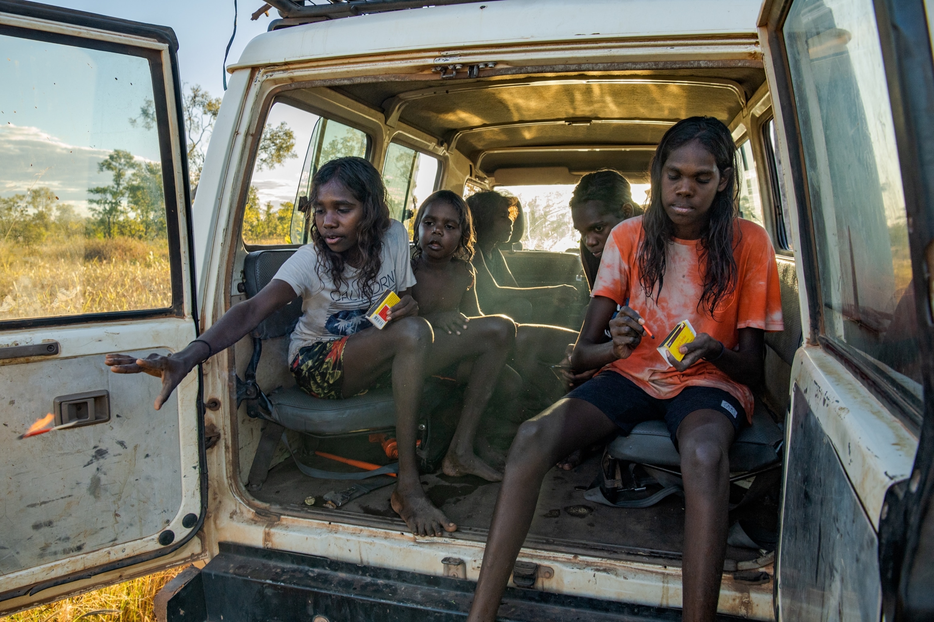 Picture of children in the van starting fire from open back doors