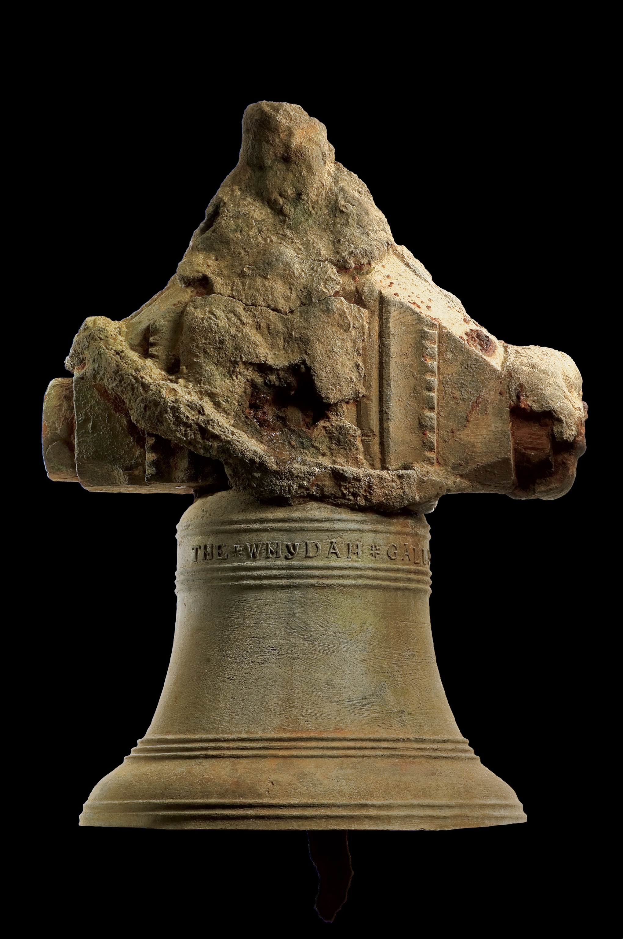 This bell recovered from the 'Whydah Gally' shipwreck is made of bronze with a wooden crosspiece. The bell was an important ship component, informing pirates of when to work, sleep, eat, and fight.