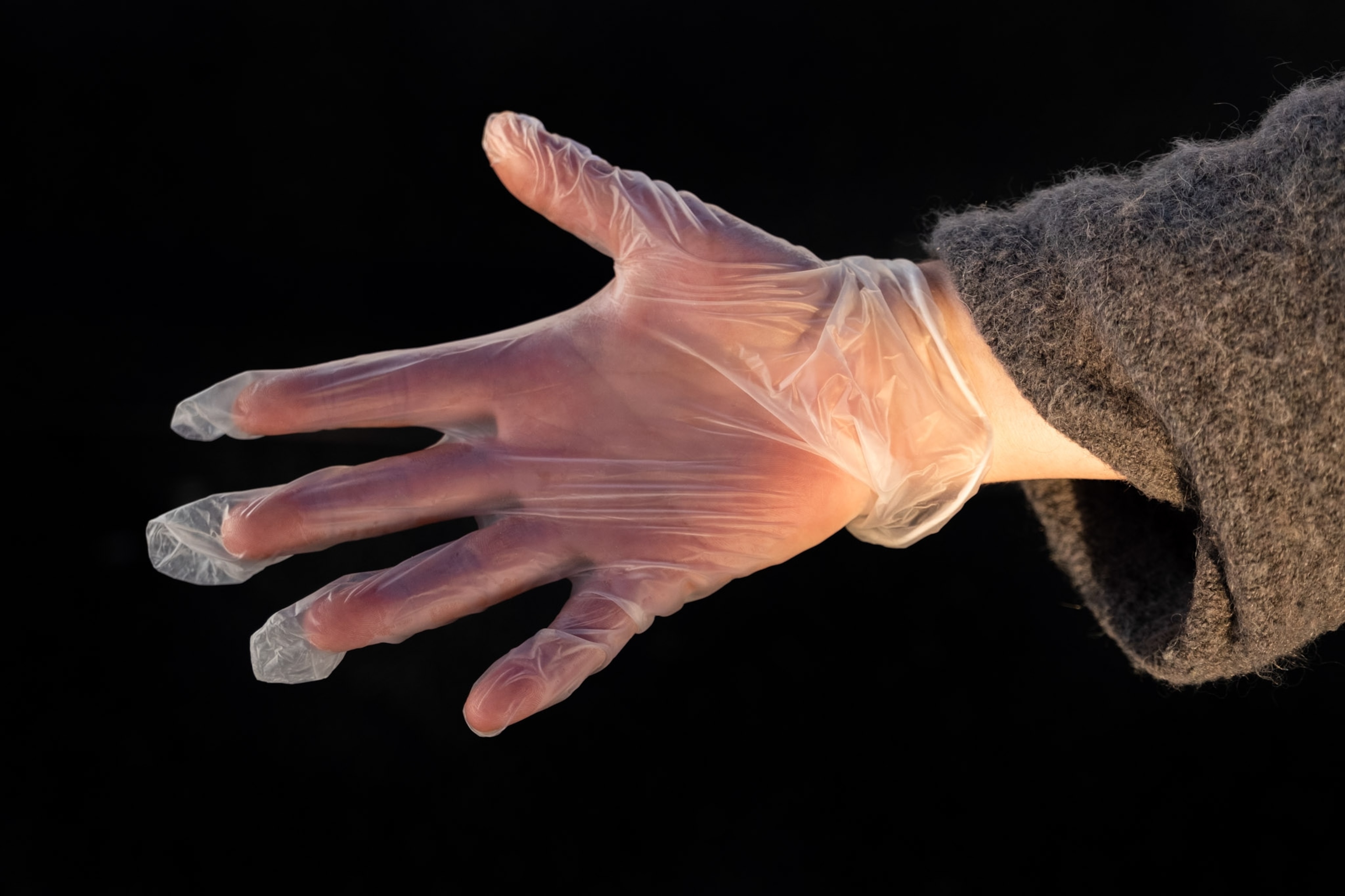 a gloved hand