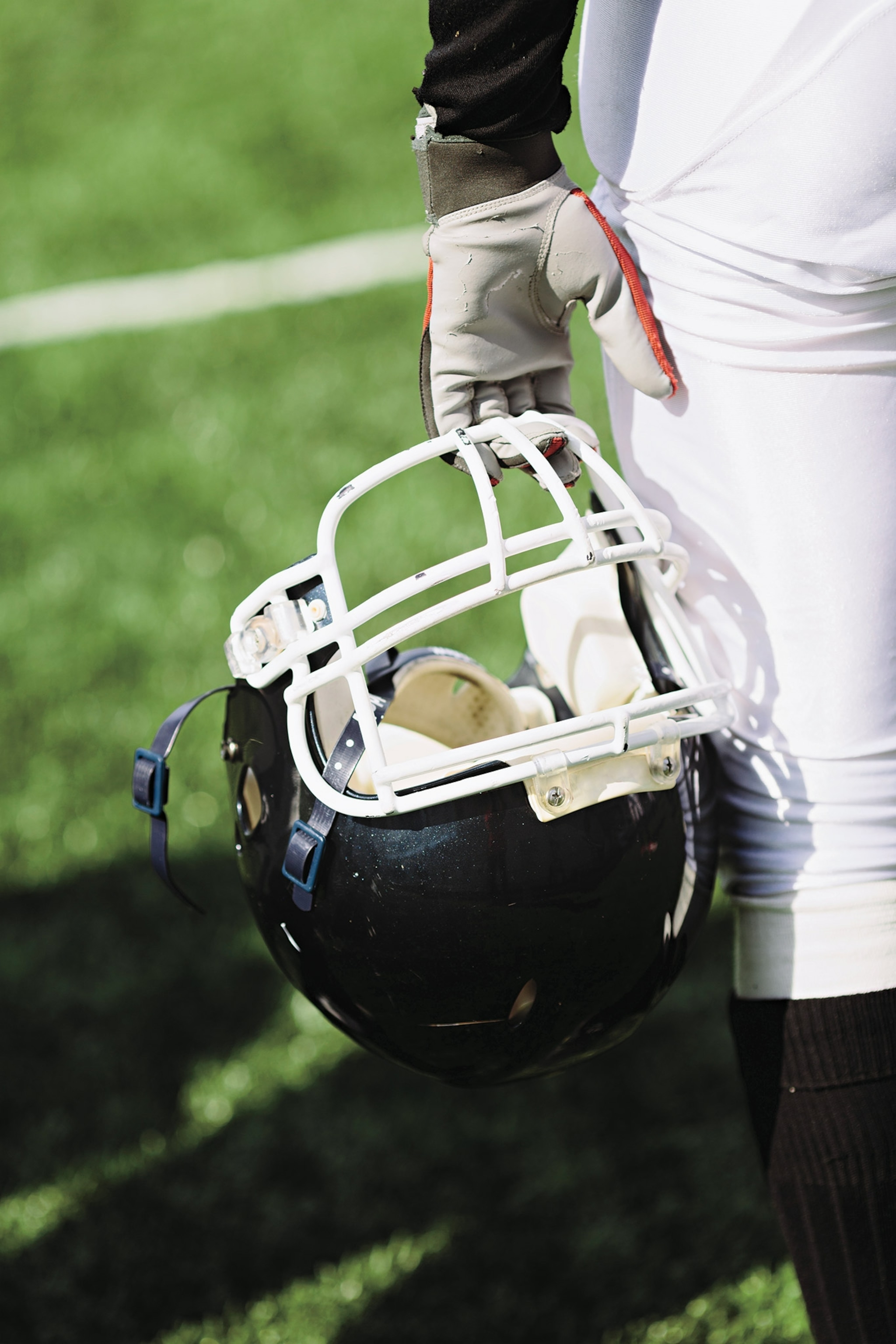 Hand Of Player With Black Helmet