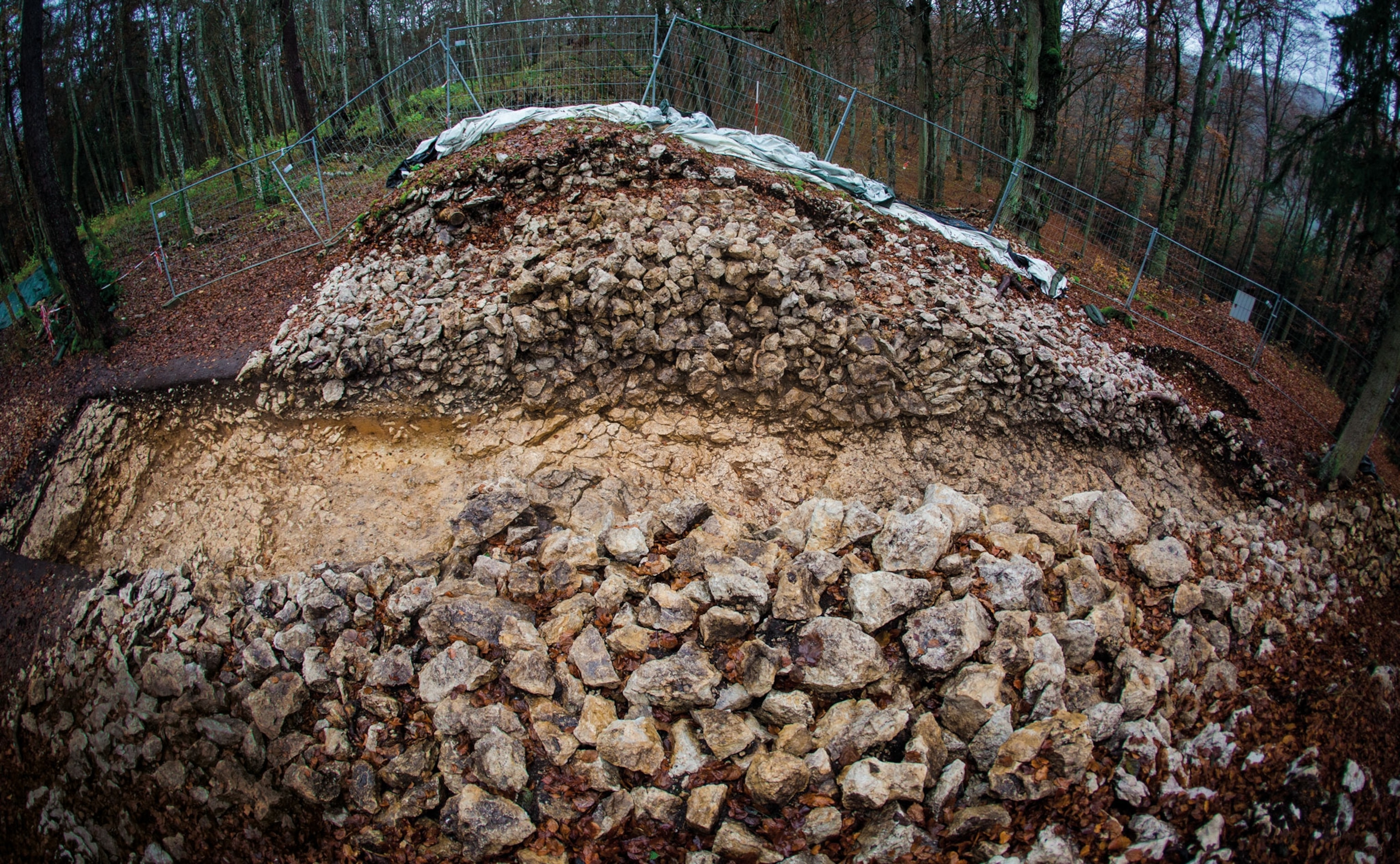 A path cuts through a piles of stones