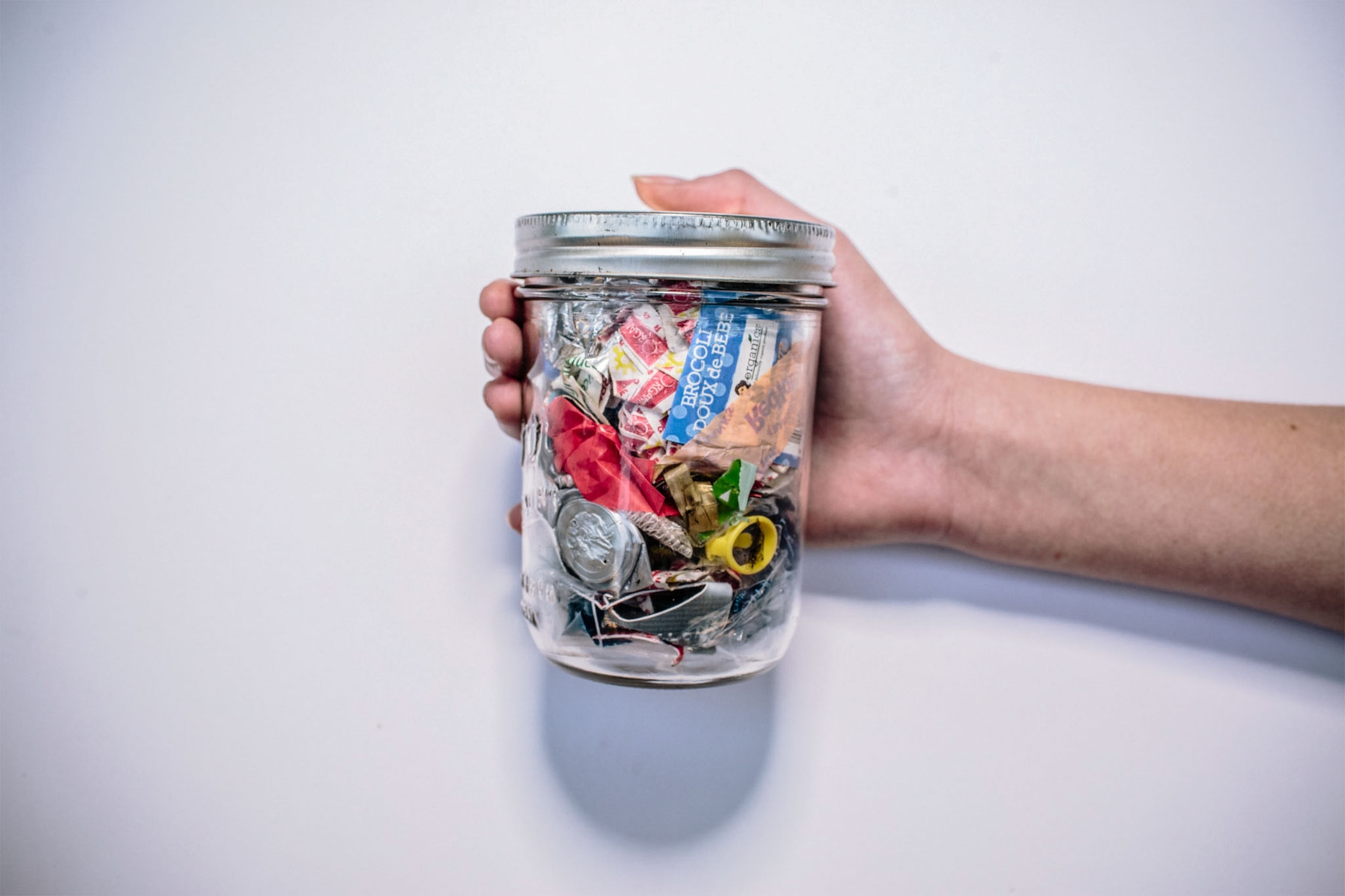 a jar filled with collected trash