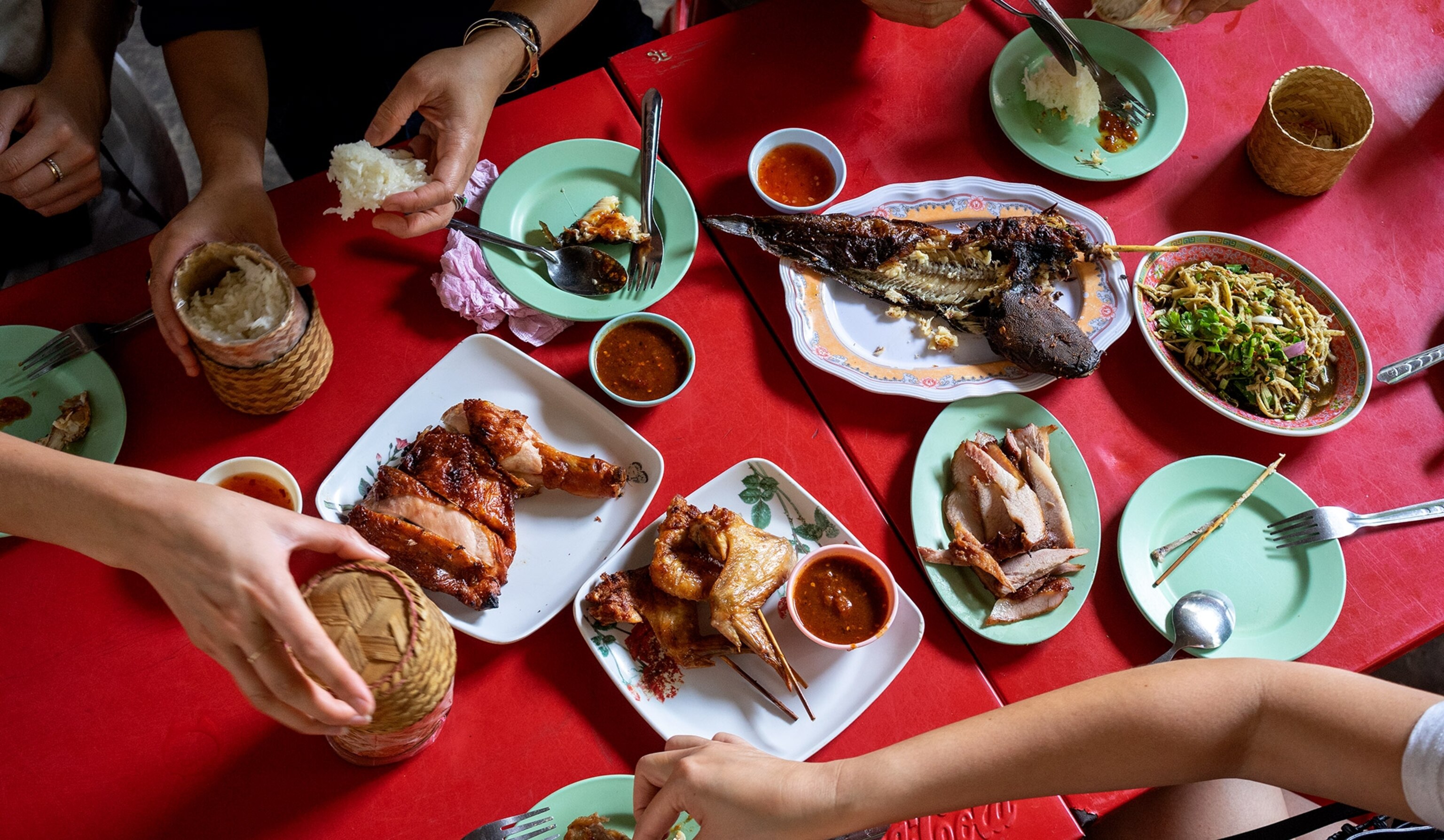 An overhead view of a plate of Northeastern style Thai cuisine