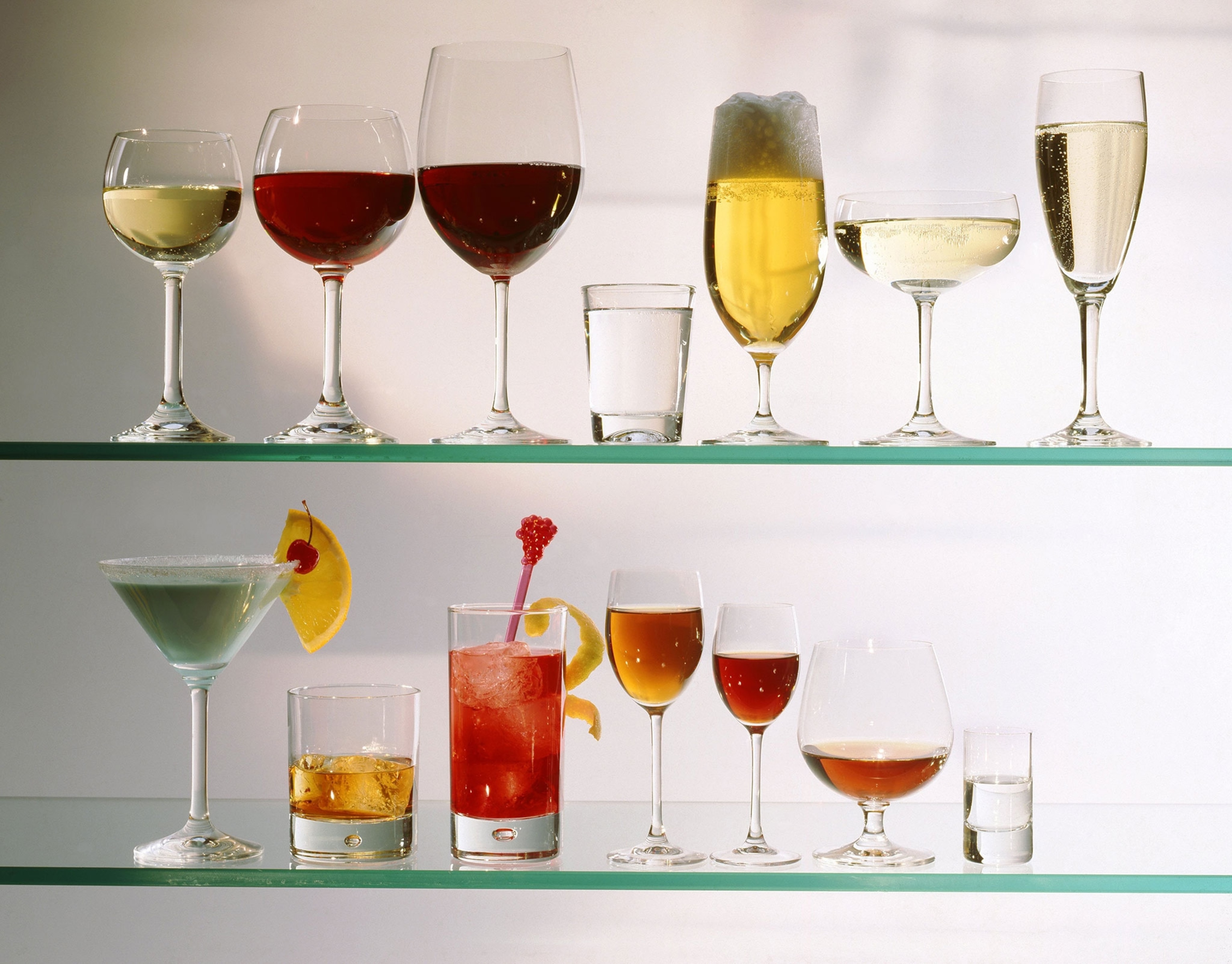 an assortment of different glasses used to serve alcoholic drinks