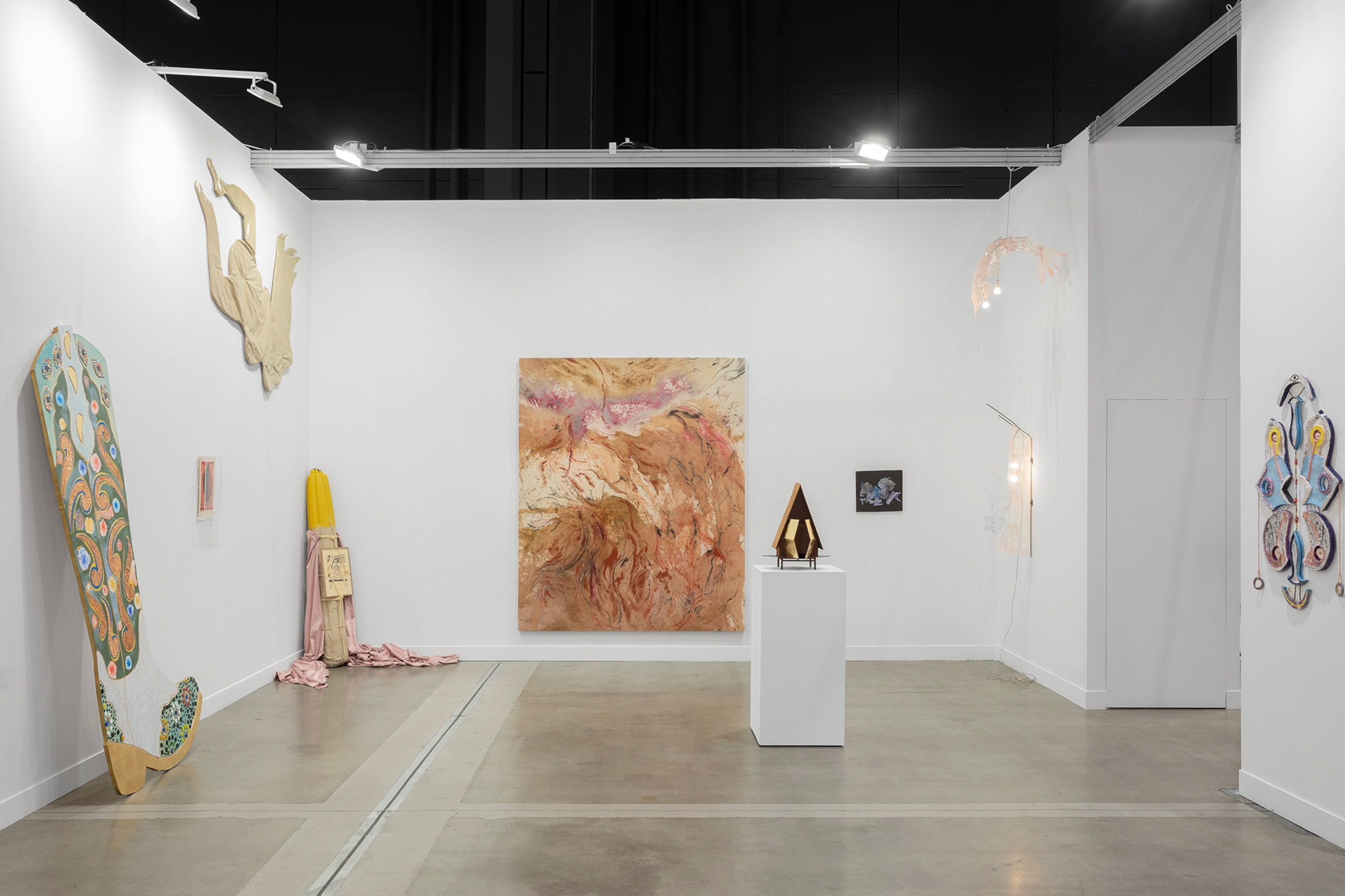 Sculptures and paintings in a gallery