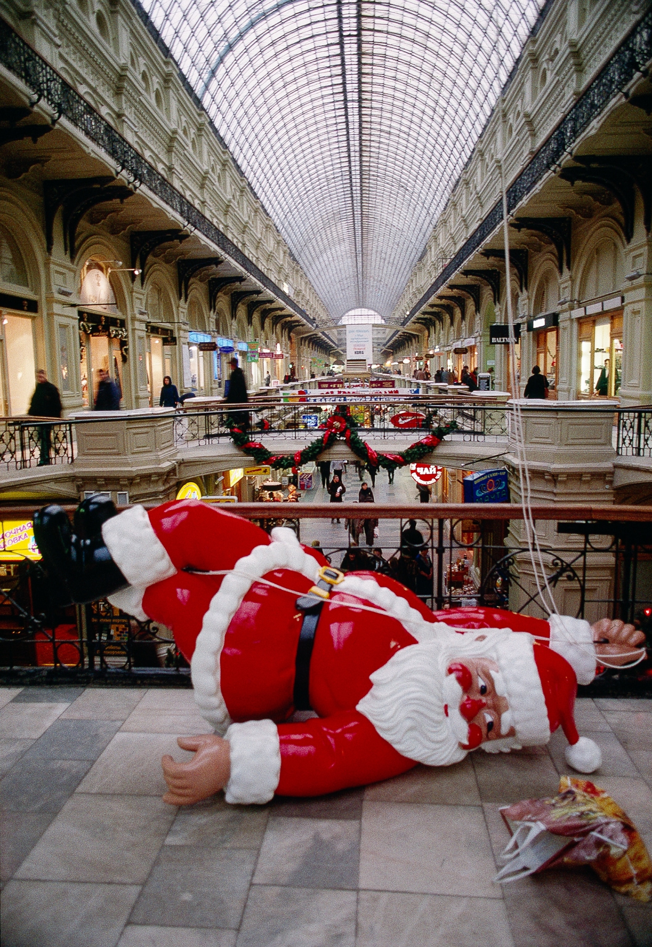a Santa Clause decoration being erected in Russia.