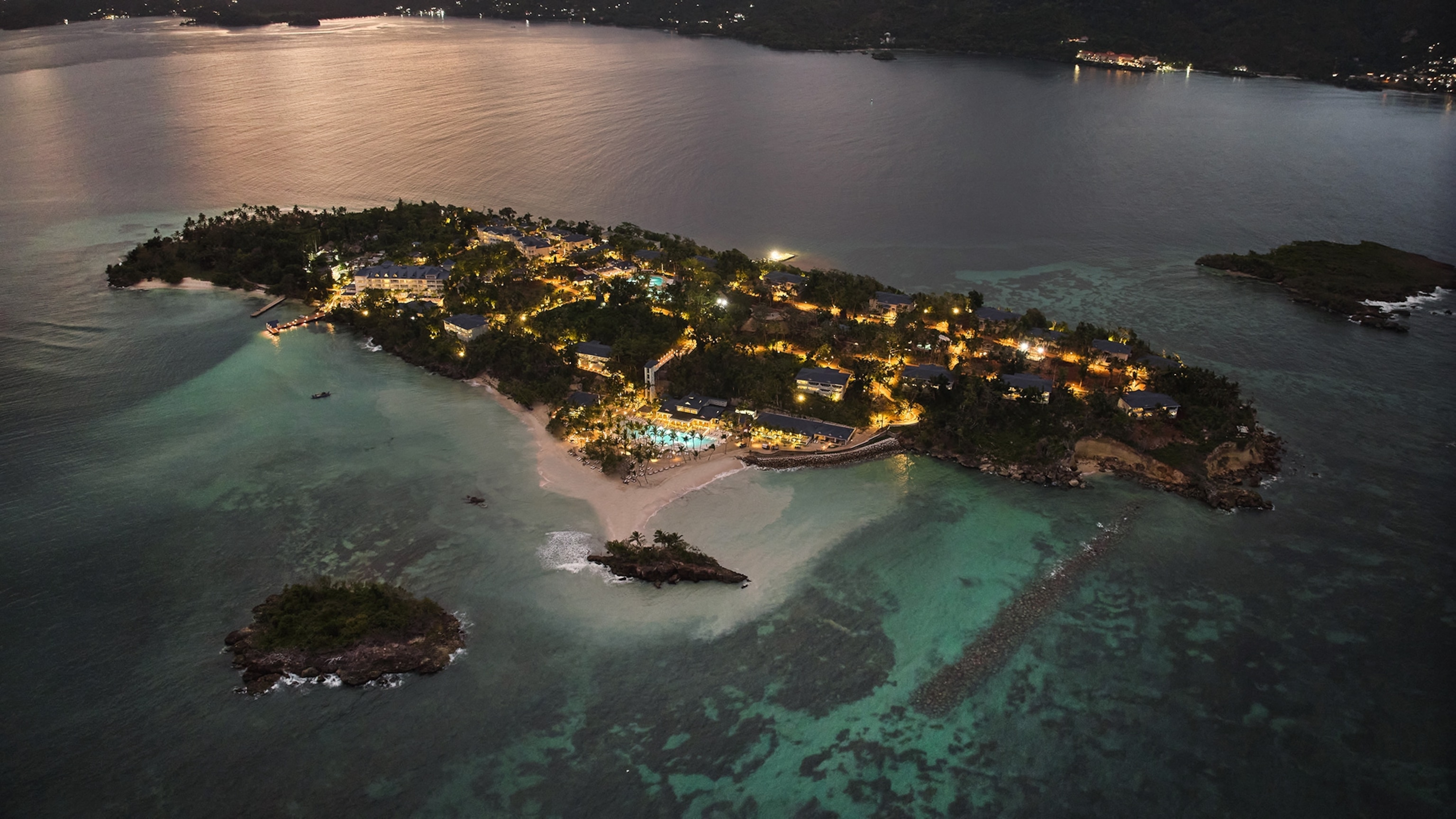 Aerial view of the Cayo Levantado Resort at night.