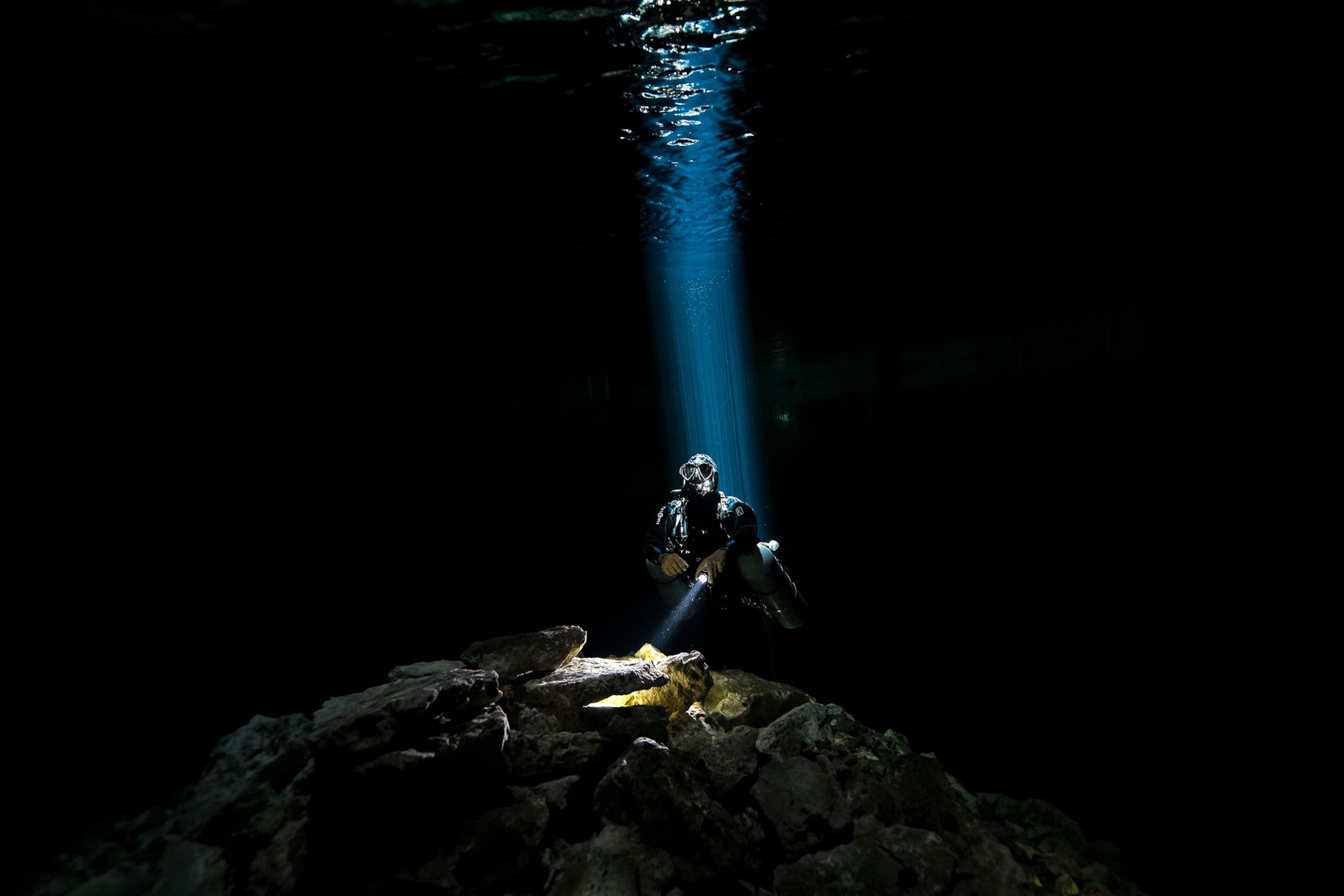a dark cavern under water