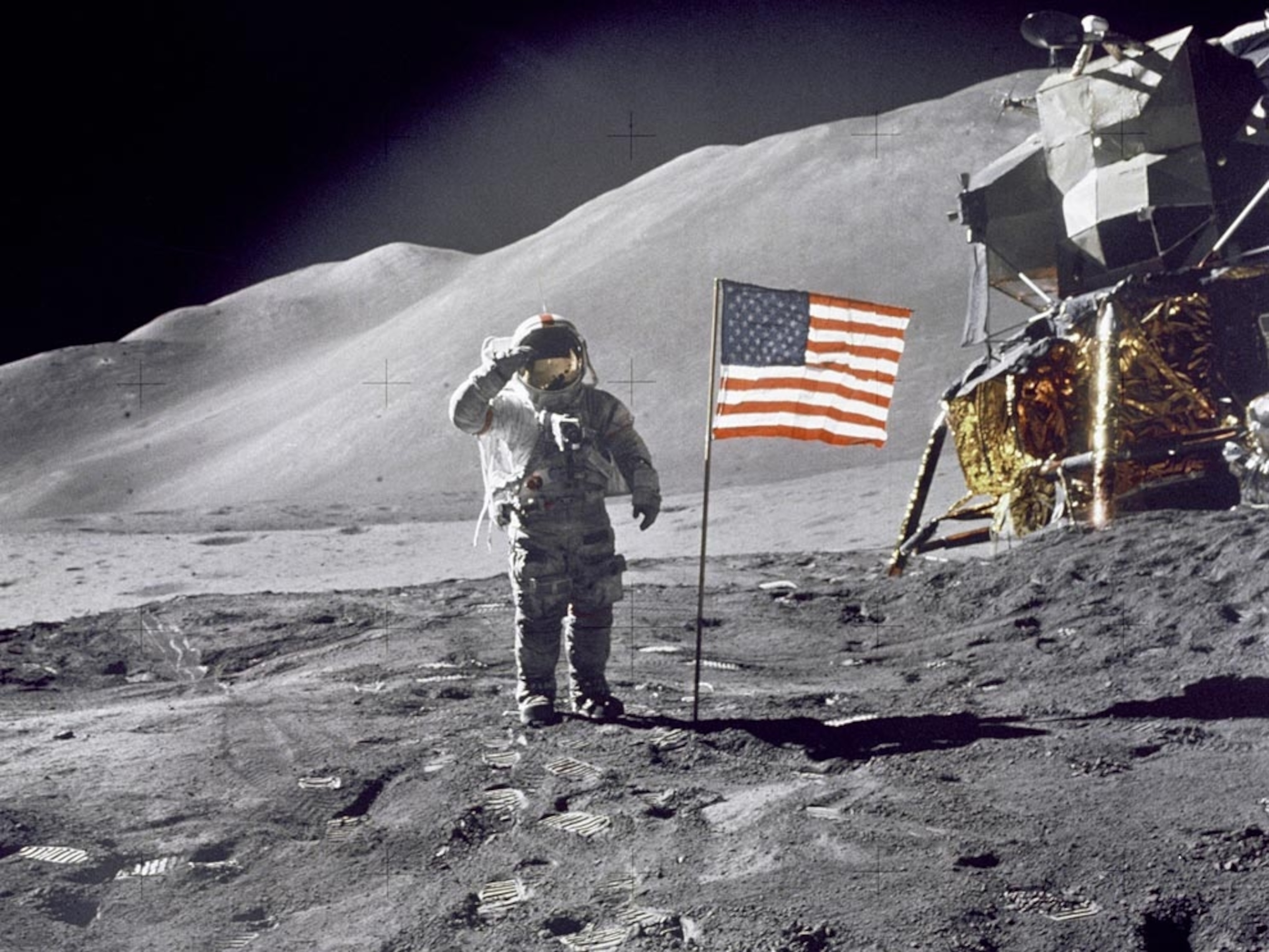 Apollo 15 Commander Dave Scott salutes the flag