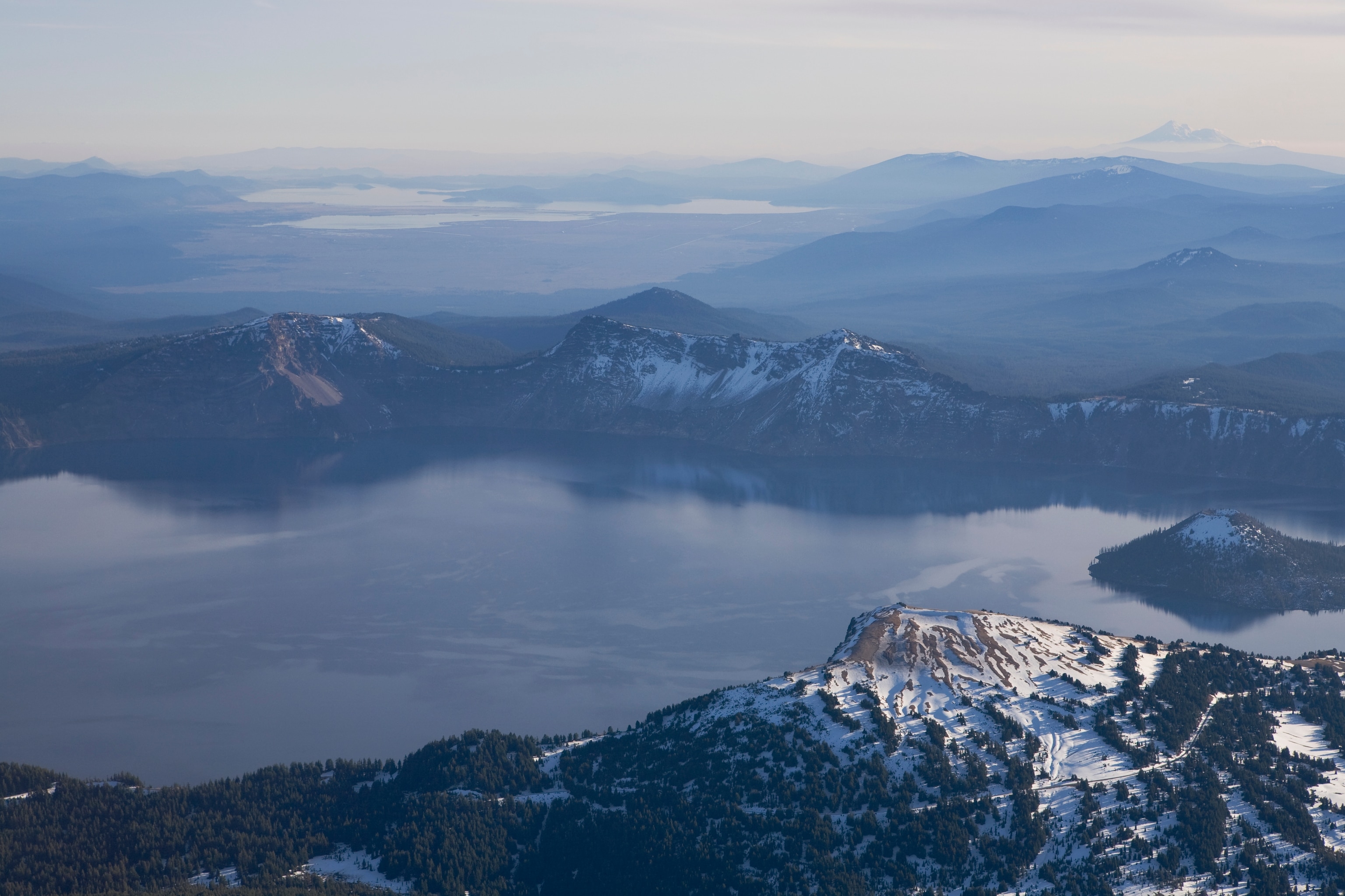 Lava outcrops jut from the northwest rim of Crater Lake.