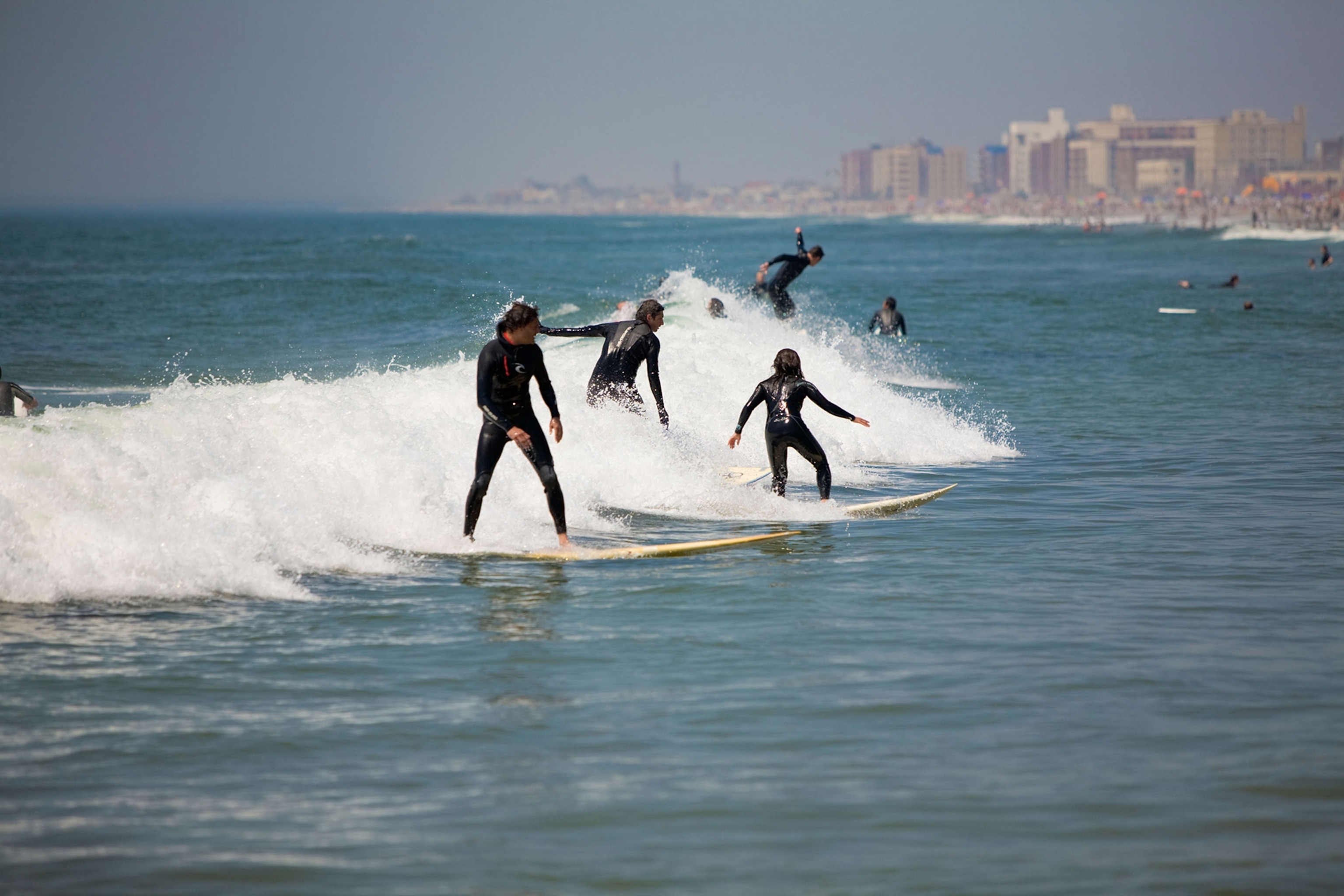 surfers in Queens, New York