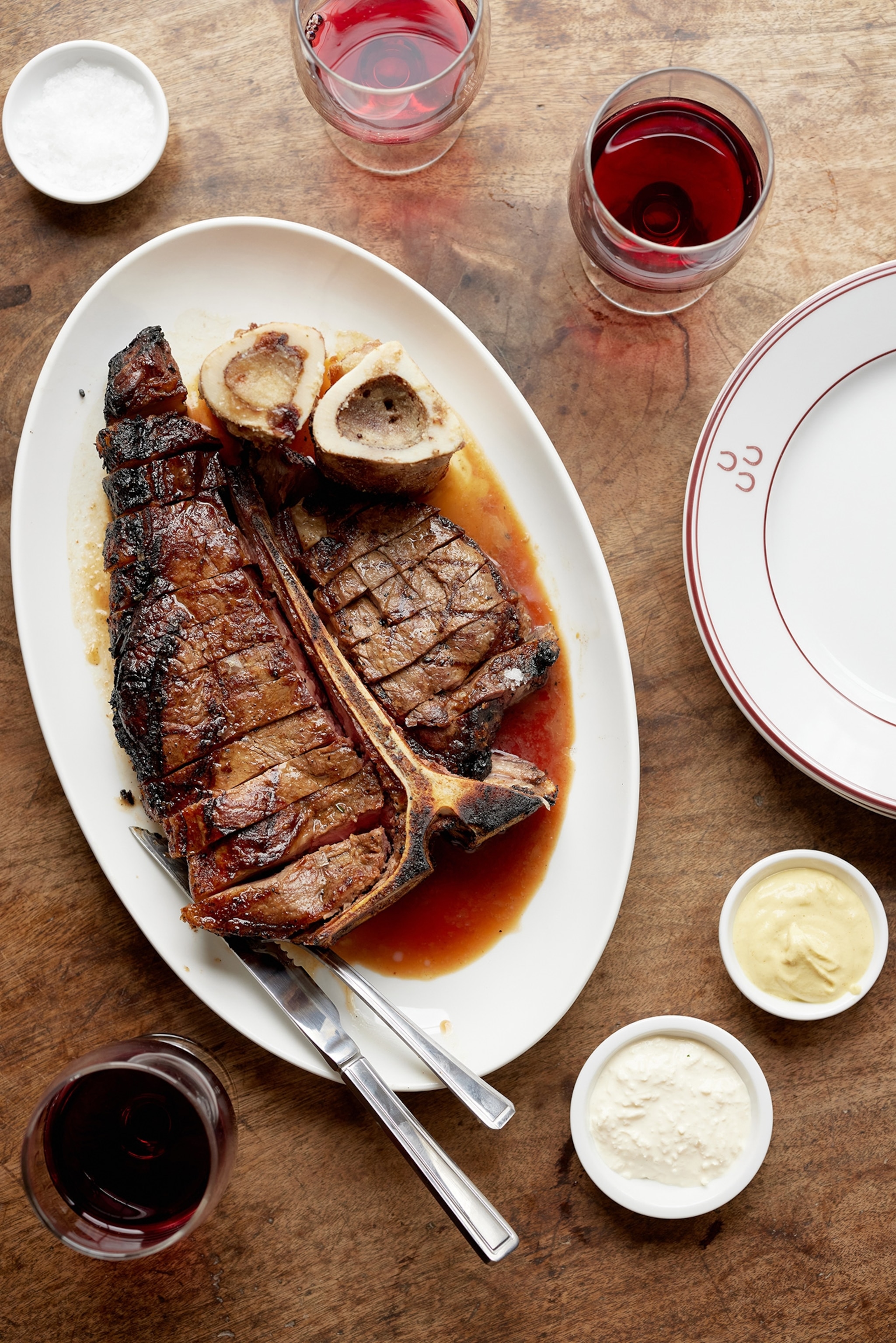 A dish of T Bone, Watercress, and Horseradish prepared by The Three Horseshoes.