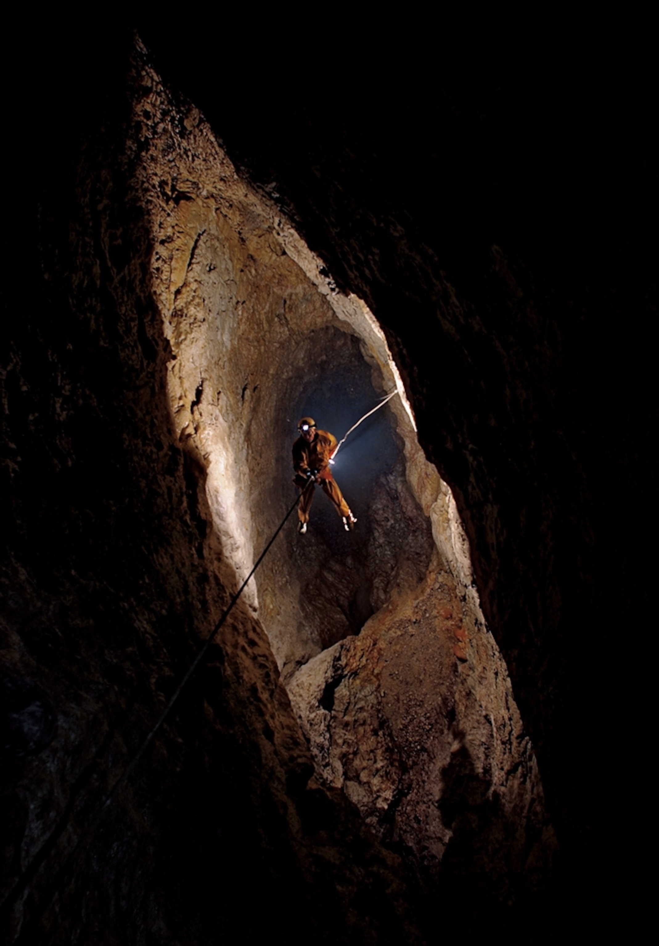 A caver in Krubera Cave